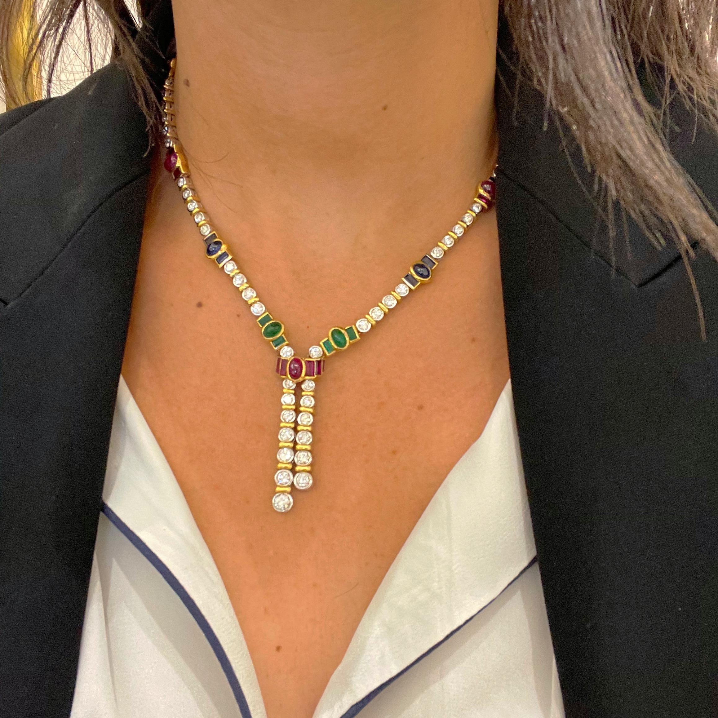 Designed by Barzizza of Valenza, Italy.  Founded in 1958 the firm produces very limited series of unique jewelry pieces.This 18 karat white and yellow gold lariat style necklace is the perfect example of their quality workmanship.
White gold bezel