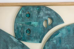 Bas-relief panel “Sortez du cadre !” in wood and oxidized copper.