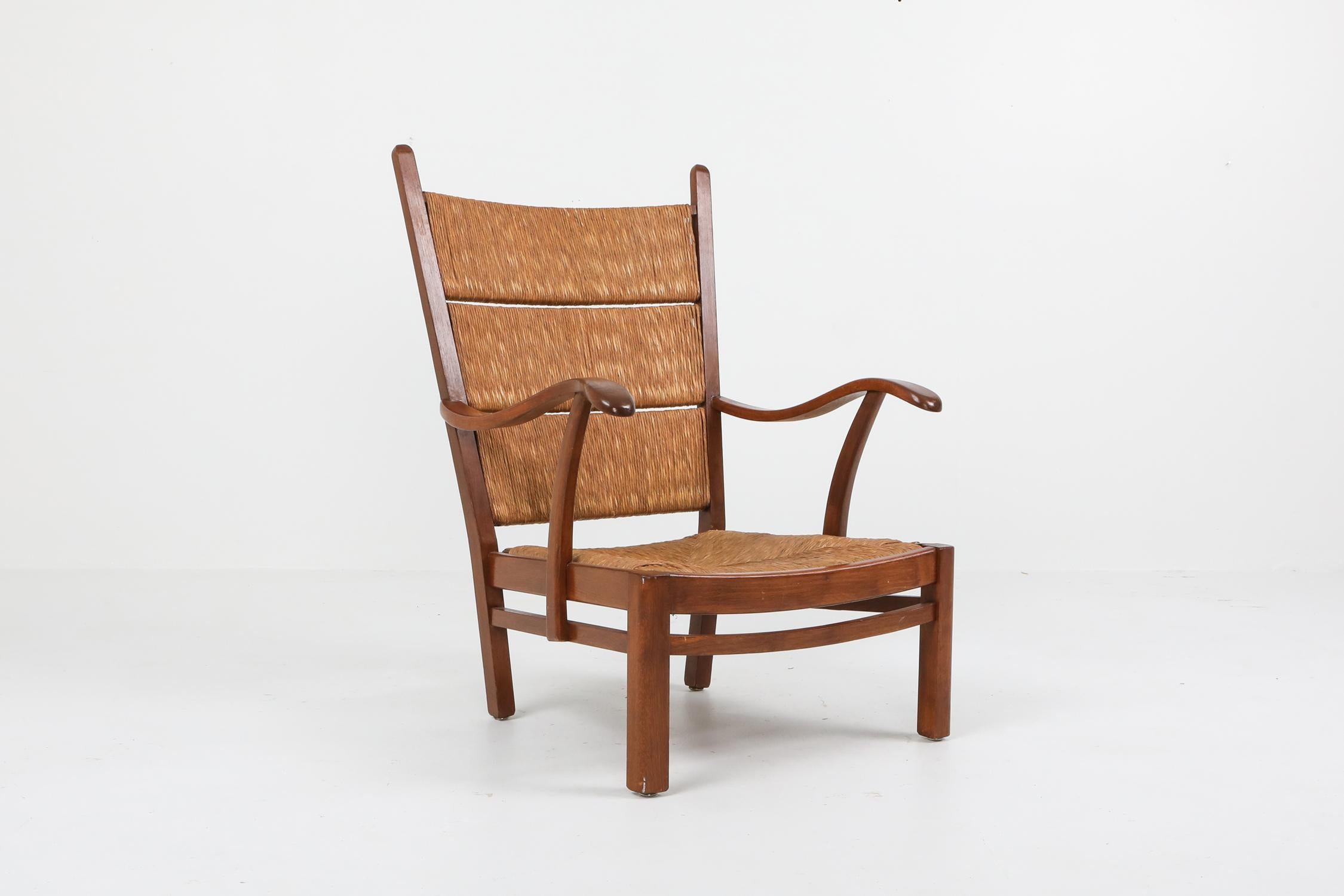 Mid-Century Modern Bas Van Pelt (attributed) high back armchairs in oak and straw, the Netherlands, 1940s. The armchair is made in solid oak and straw, attributed to Dutch Designer Bas Van Pelt. The construction of this rare early 1940s design is