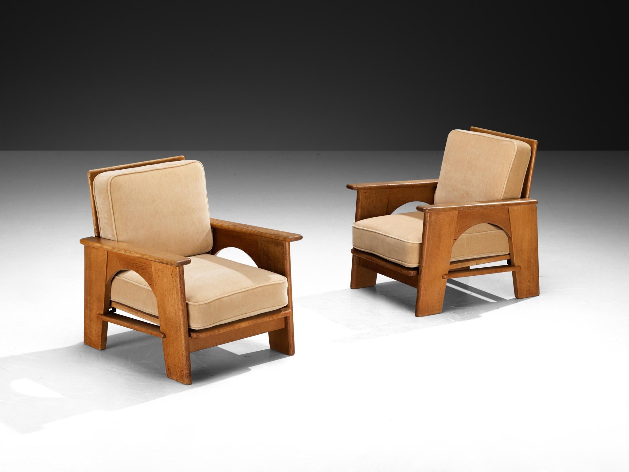 Bas van Pelt for My Home, pair of lounge chairs, oak, fabric, the Netherlands, 1930s/1940s

These elegant lounge chairs were designed by Dutch designer Bas van Pelt and produced in the Netherlands during the 1930s or 1940s. Crafted from solid oak,