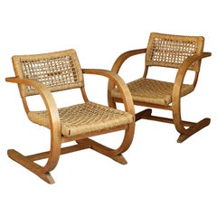 Bas Van Pelt Pareja de sillones de cuerda de paja tejida y madera curvada Países Bajos Años 30