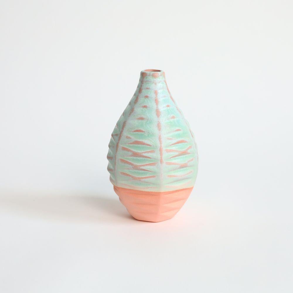 Basalt Handcrafted Vase in Strawberry Pistachio
Basalt combines the natural beauty of pattern formations with the elegance of a handcrafted vase. Inspired by the iconic basalt columns found in nature, this vase features an intricate pattern that