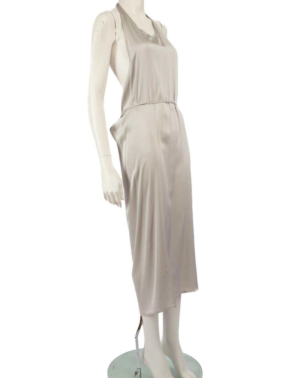 CONDITION is Very good. Minimal wear to the dress is evident. There are marks on the right side and centre front of this used Baserange designer resale item.
 
 Details
 Grey
 Silk
 Wrap dress
 Halter neck tie strap
 Midi
 Wrap fastening
 
 
 Made