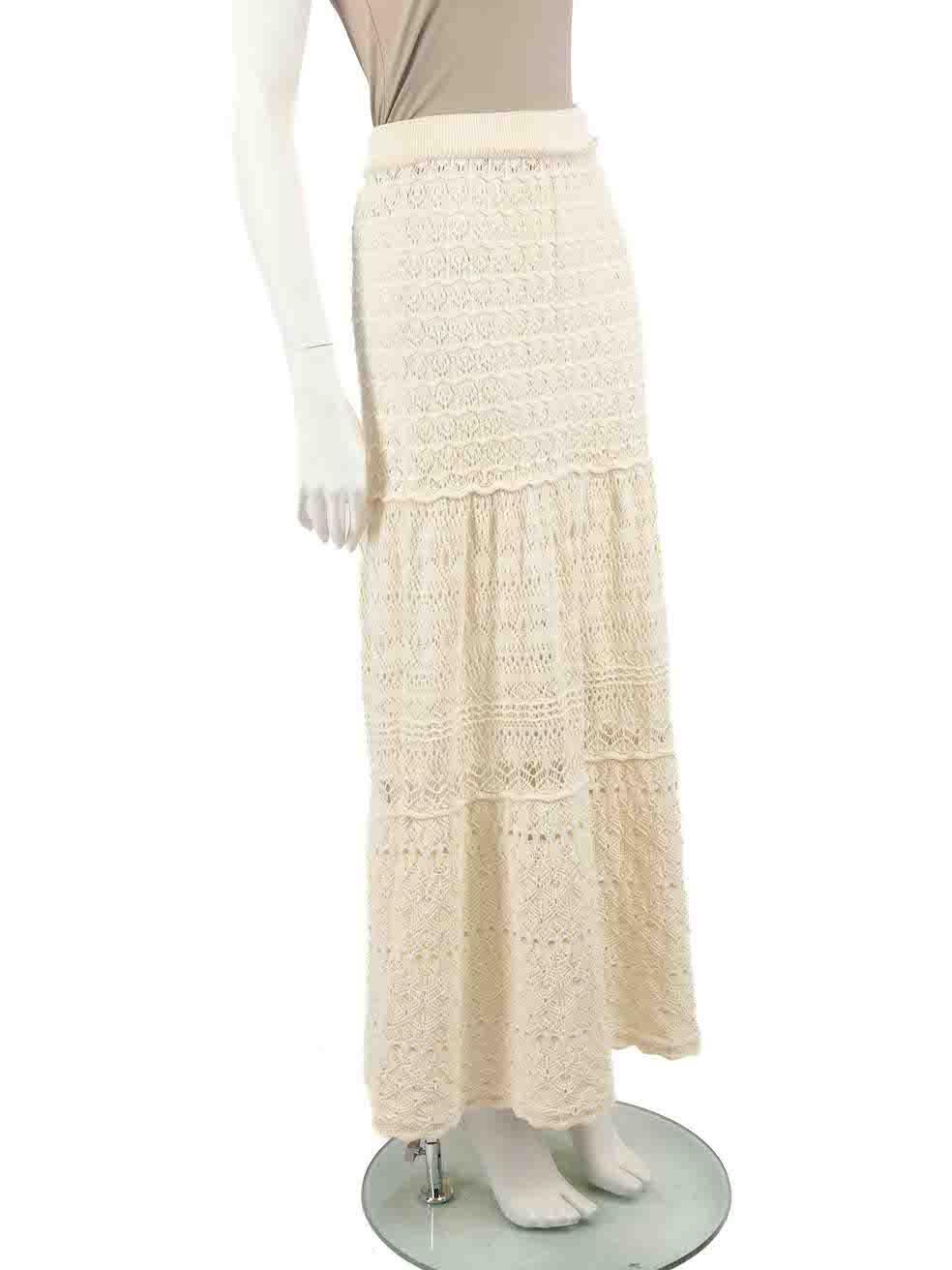 CONDITION is Very good. Minimal wear to skirt is evident. Minimal wear to the rear with a pluck to the knit on this used ba&sh designer resale item.
 
 
 
 Details
 
 
 Josh model
 
 Ecru
 
 Cotton
 
 Full skirt
 
 Maxi length
 
 Crochet knitted and
