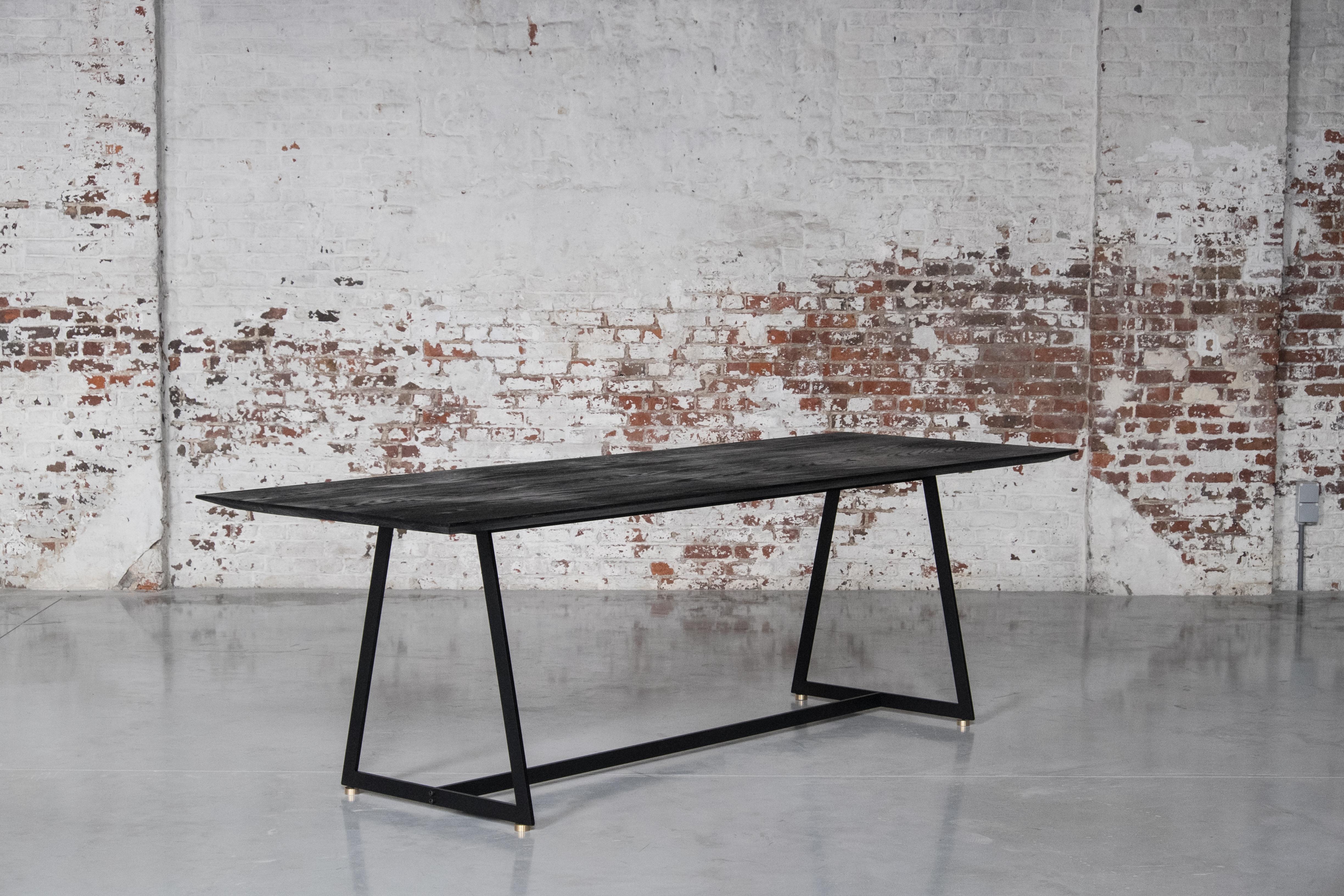 Basic dining table by Atelier Thomas Serruys
Dimensions: L 250 x W 85cm, H 75 cm
Materials: oak, steel, brass

Basic dining table
Fully demountable table with slim edged solid oak top, powder coated frame in cold drawn steel and adjustable