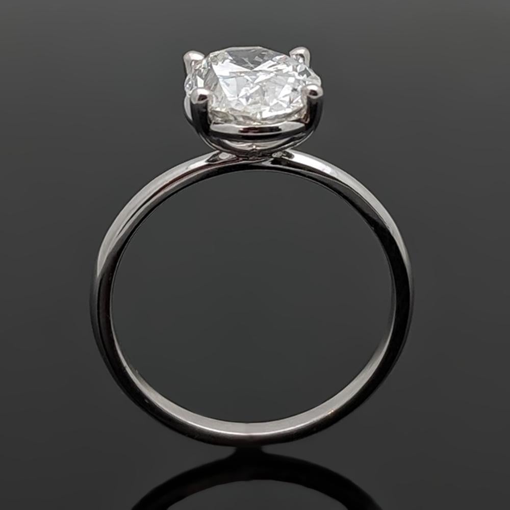 Contemporary Classic Solitaire Platinum Oval Diamond Ring For Sale