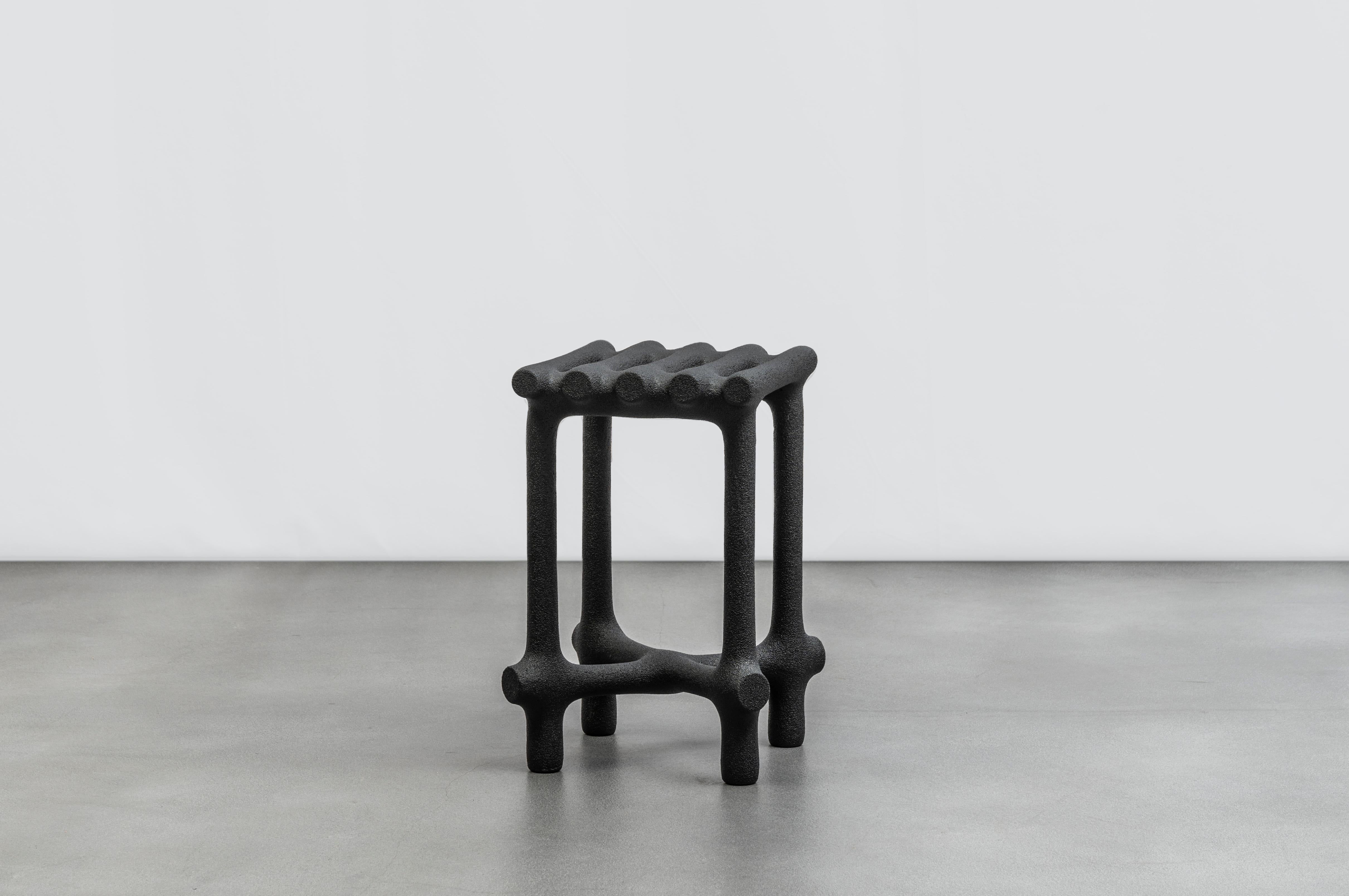 Basic stool by HWE
Limited Edition
Materials: Waste SLS 3D nylon powder, Sand from sustainable sources
Dimensions: H 48 x W 31 x D 31 cm 
Colours: black, white, cream, terracotta, mint

Hot Wire Extensions is a young sustainable design brand,
