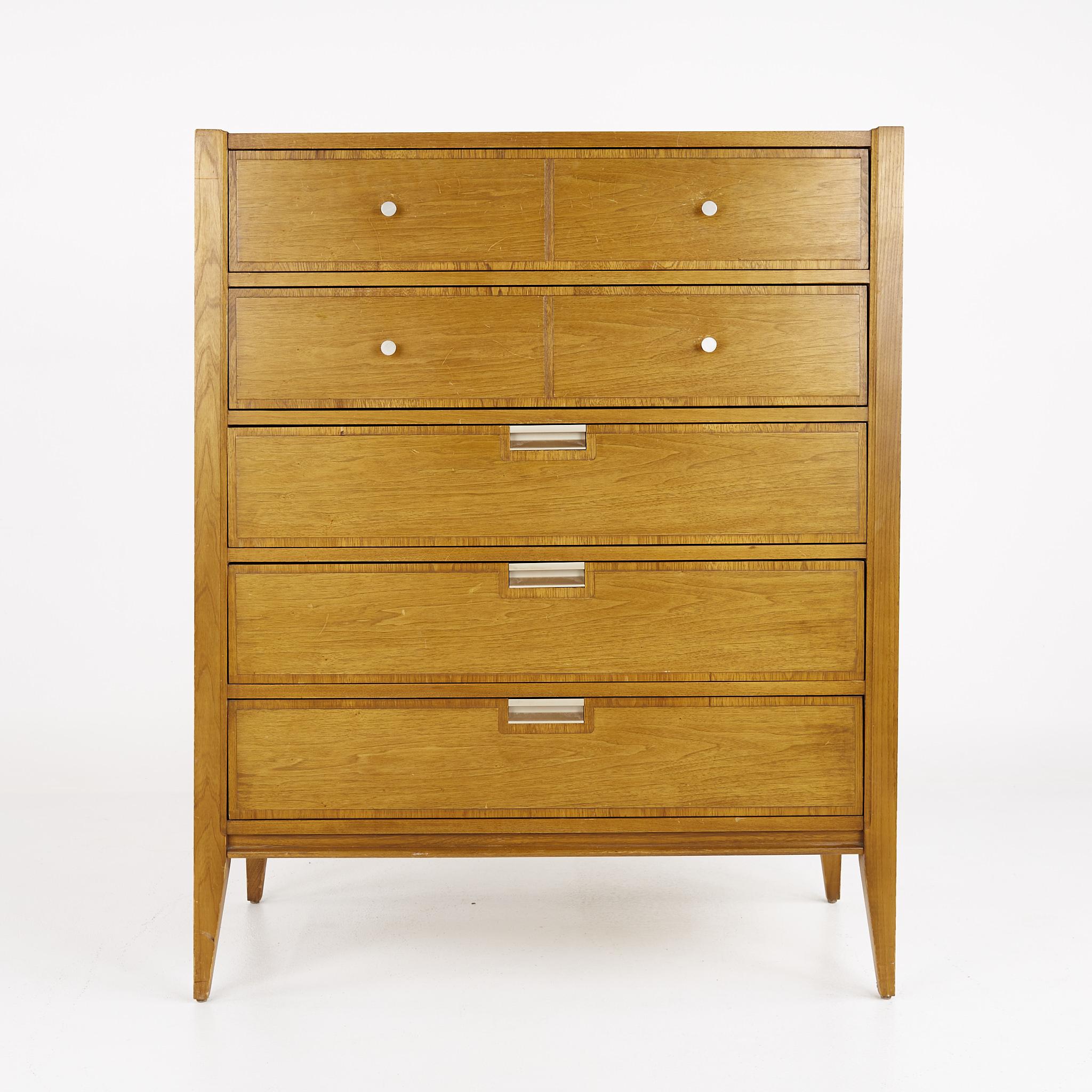 Basic Witz Mid Century Walnut 5 Drawer Highboy Dresser

This dresser measures: 36 wide x 18 deep x 44.5 inches high

?All pieces of furniture can be had in what we call restored vintage condition. That means the piece is restored upon purchase so