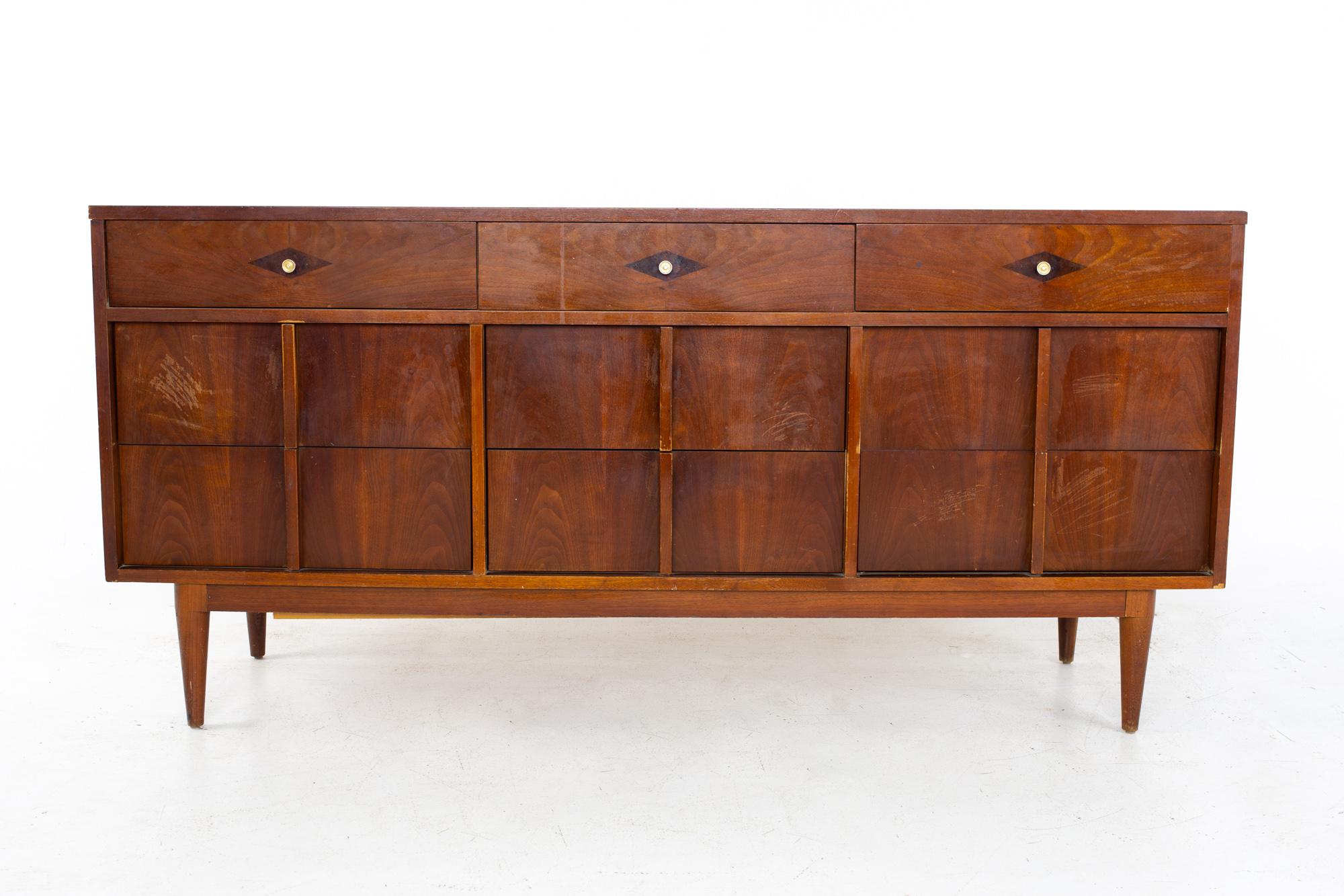 Basic Witz mid century walnut 9 drawer lowboy dresser
Lowboy measures: 66 wide x 18 deep x 31 inches high

All pieces of furniture can be had in what we call restored vintage condition. That means the piece is restored upon purchase so it’s free