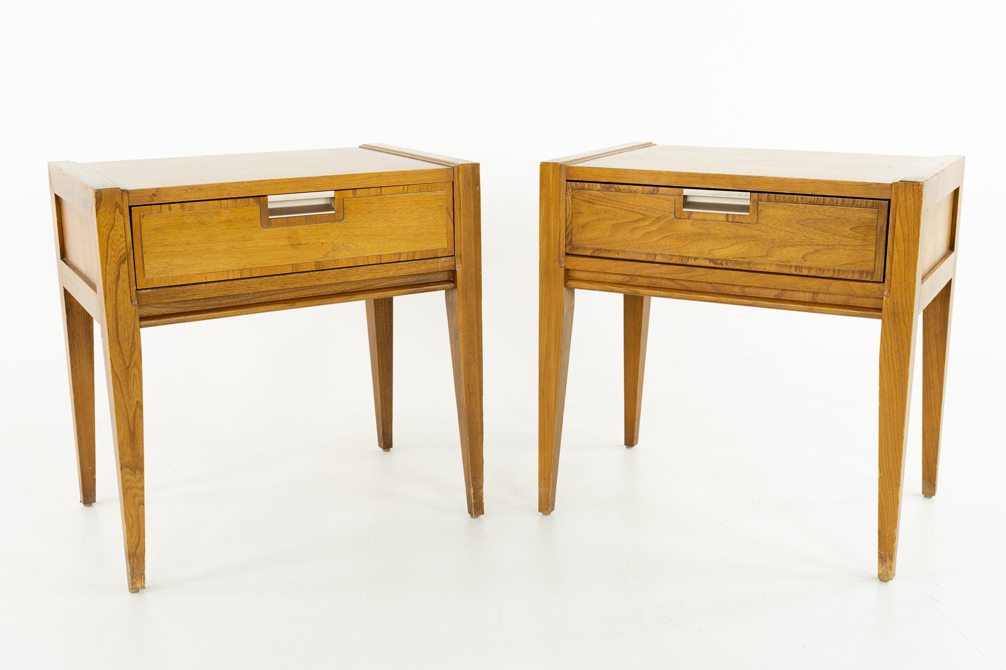 Basic Witz mid century walnut nightstands - pair

These nightstands measure: 22 wide x 15 deep x 22.5 inches high

?All pieces of furniture can be had in what we call restored vintage condition. That means the piece is restored upon purchase so