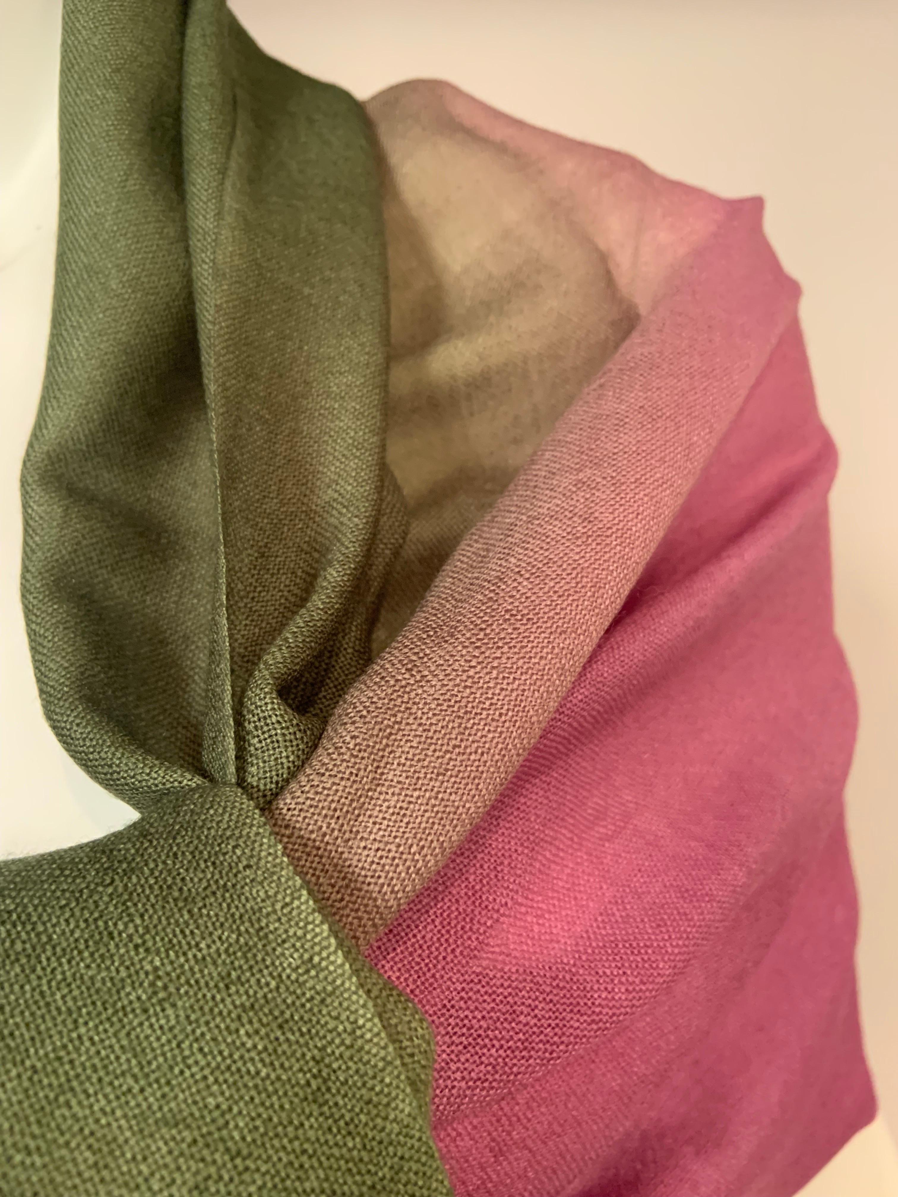 One side lavender, one side green and the most subtle ombre effect in the center. This is a very fine wool shawl or scarf from Basile. The colors melt into one another, it is that beautiful.  The shawl has never been worn and is in excellent
