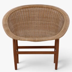Silla «Basket» de teca, de Nanna Ditzel