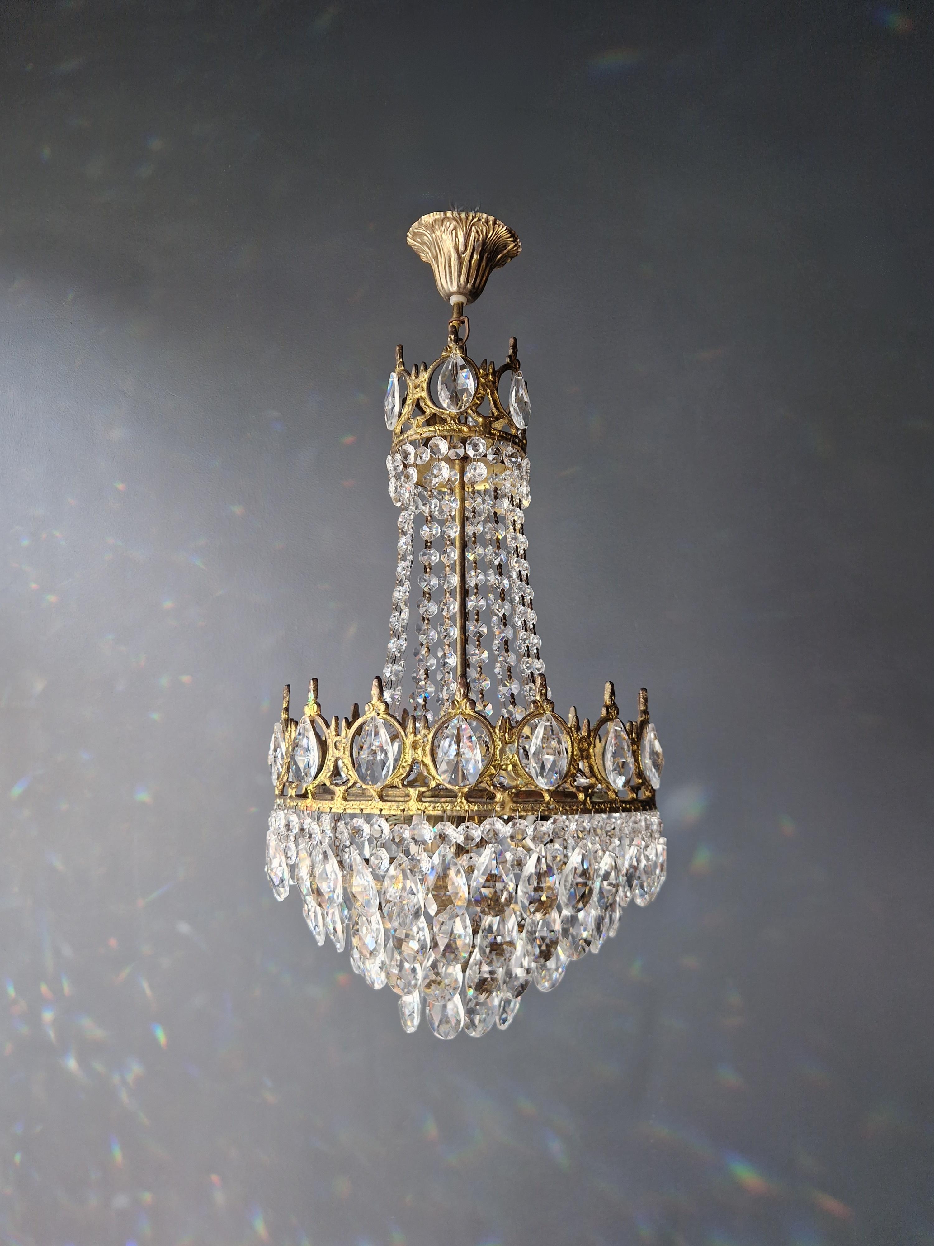 Introducing our exquisitely restored old chandelier from Berlin! This stunning piece has been professionally refurbished with care and love, and its electrical wiring is compatible with the US. It has been re-wired and is ready to be hung, boasting