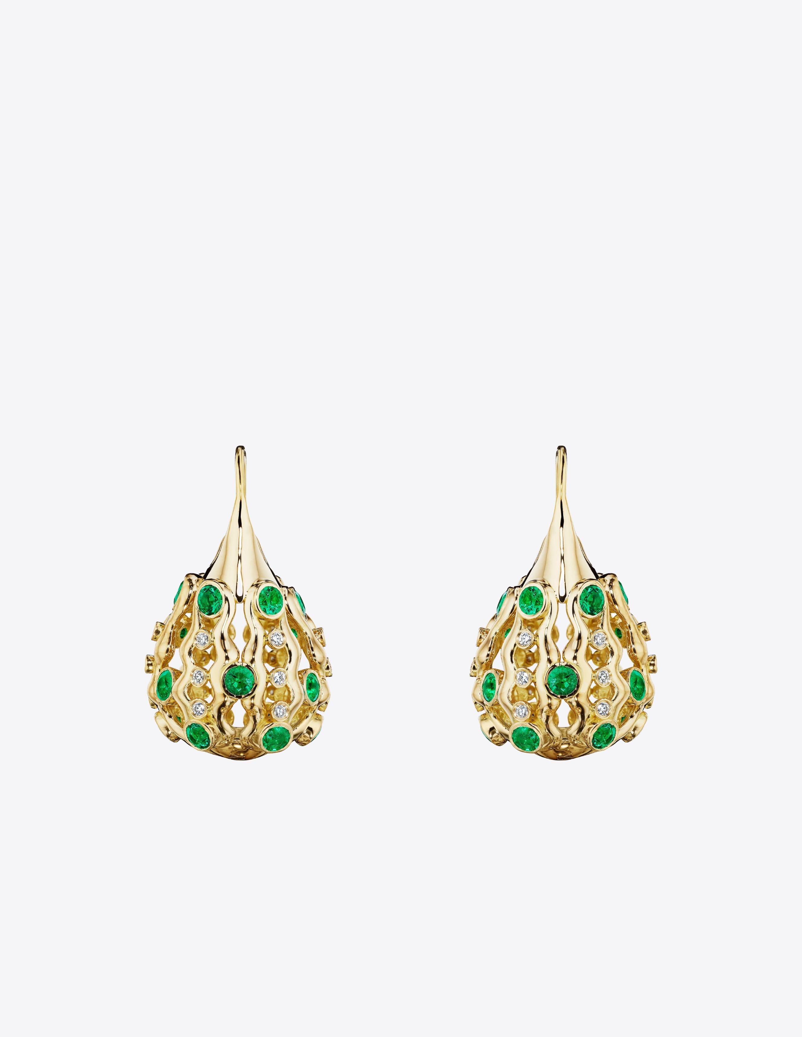Inspired by ornate woven Gullah baskets woven in the American Southeast, generational craftsmanship, precious tradition. Drop earrings rendered in 18k gold and set with faceted emeralds and diamonds. 1.25 drop on hook fastening for pierced ears.