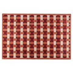 Tapis tressé orange sanguine
