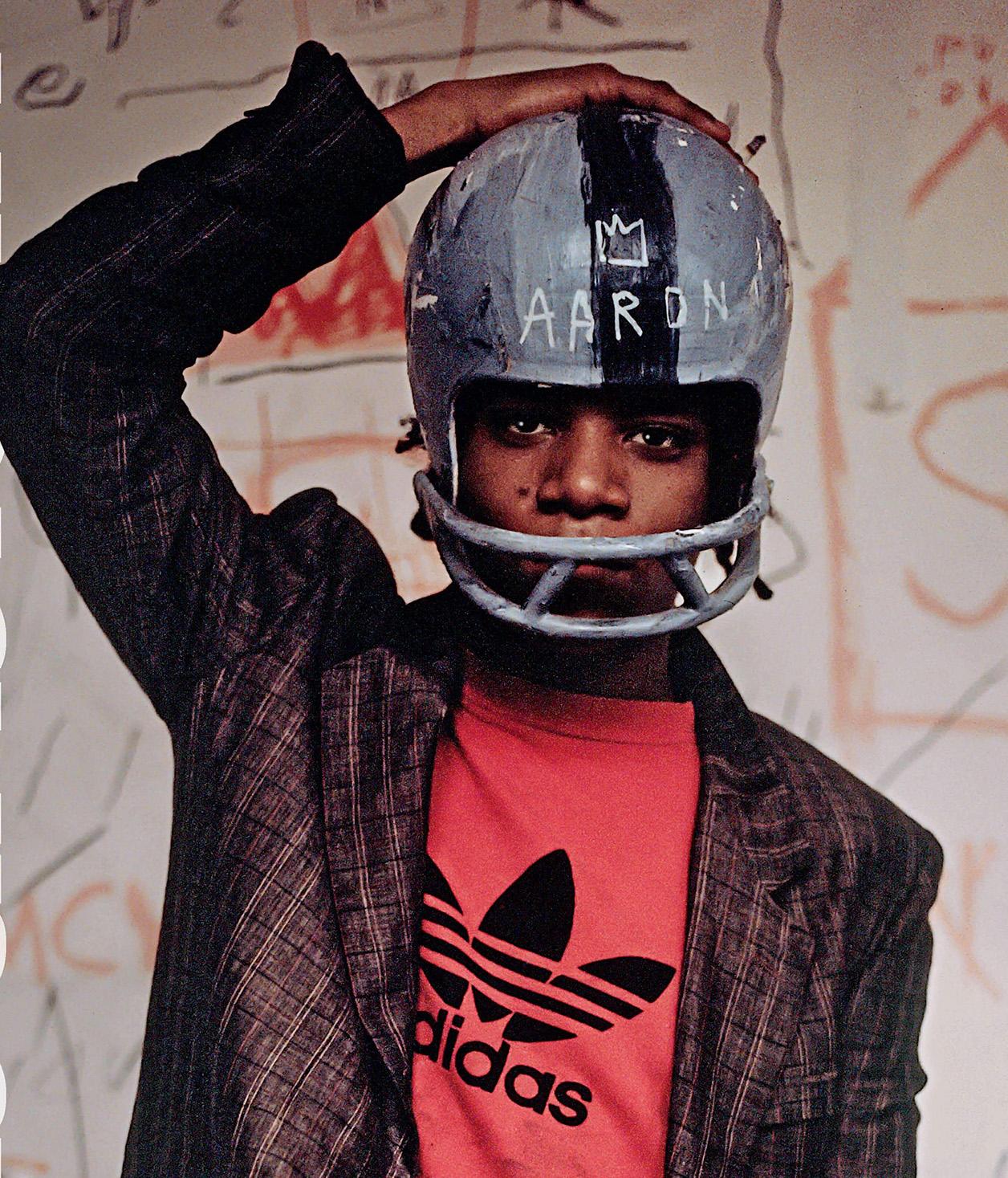 Jean-Michel Basquiat 'Boom for Real':
Original exhibition poster to the much heralded 2017 London exhibition at the Barbican Centre London. Poster is based off the iconic photograph: 'Jean-Michel Basquiat Wearing an American Football Helmet', 1981