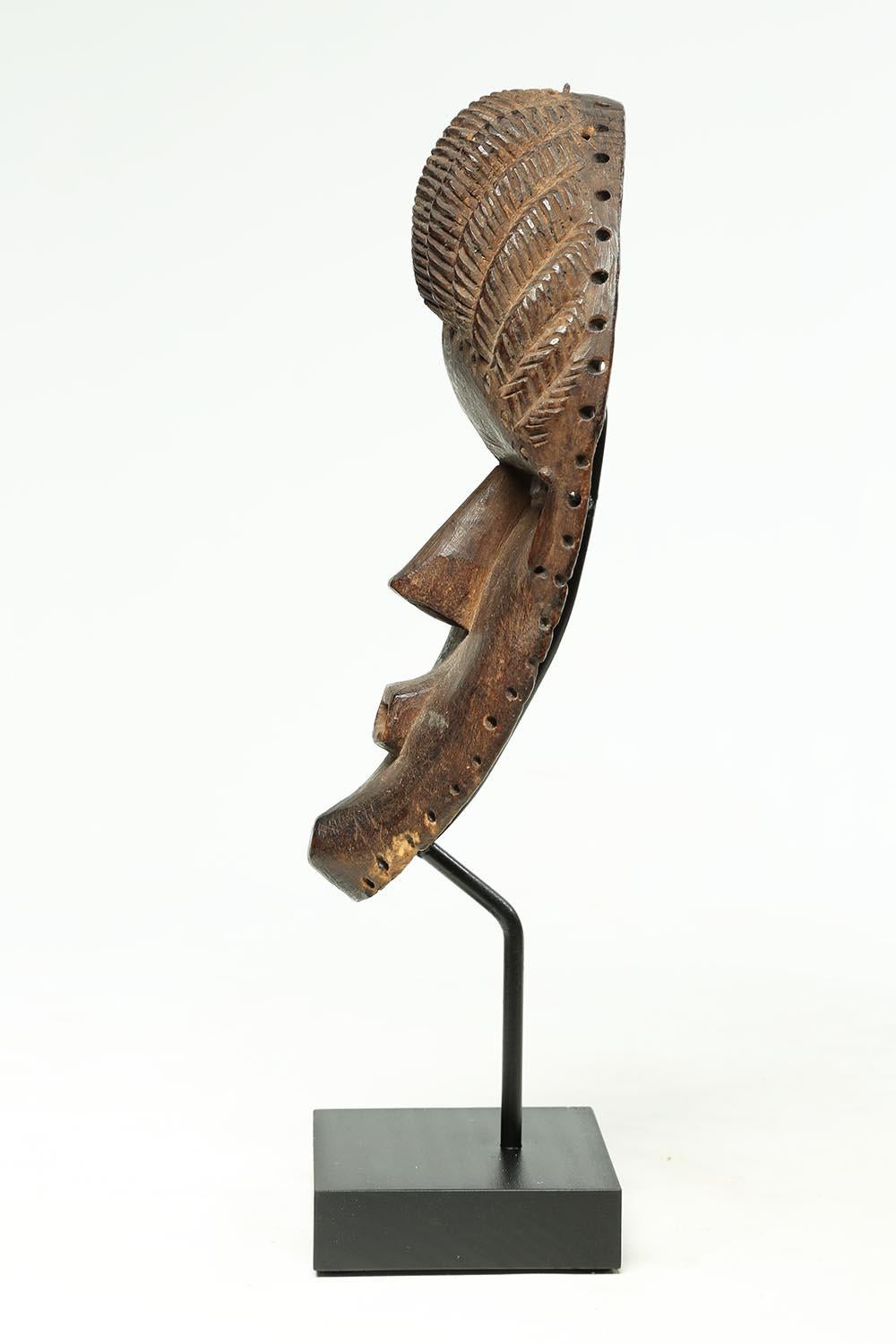 Liberian Bassa Tribal Wood Dance Mask with Geometric Features, Early 20th Century, Africa For Sale