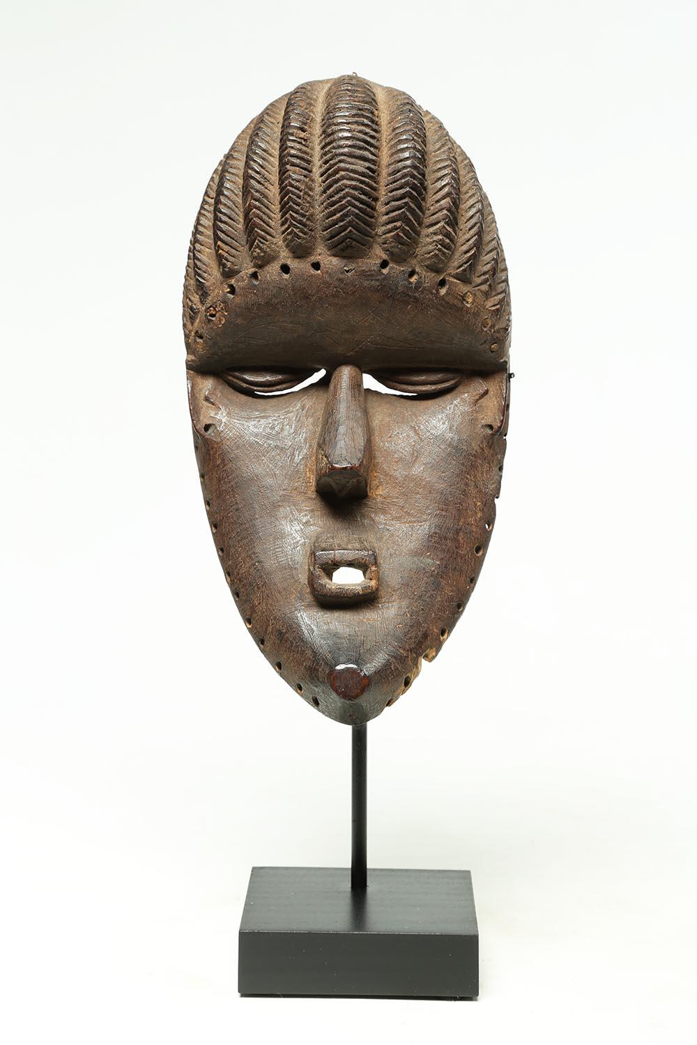 Hand-Carved Bassa Tribal Wood Dance Mask with Geometric Features, Early 20th Century, Africa