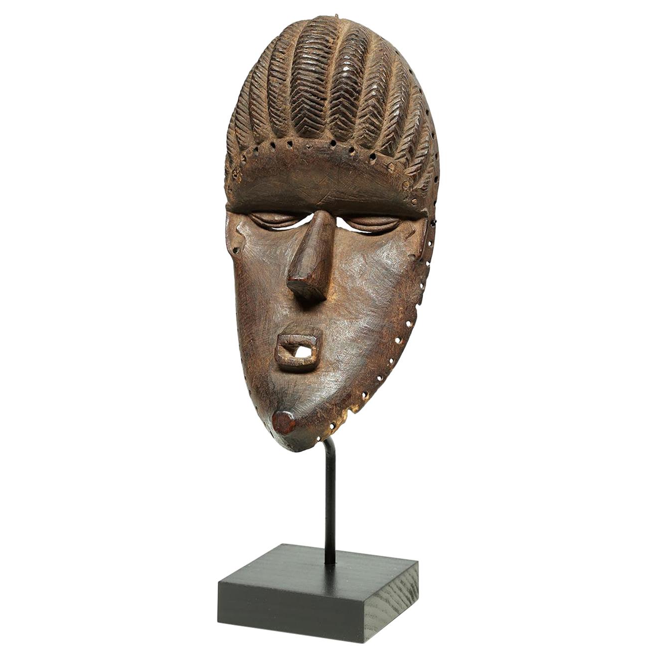 Bassa Tribal Wood Dance Mask with Geometric Features, Early 20th Century, Africa