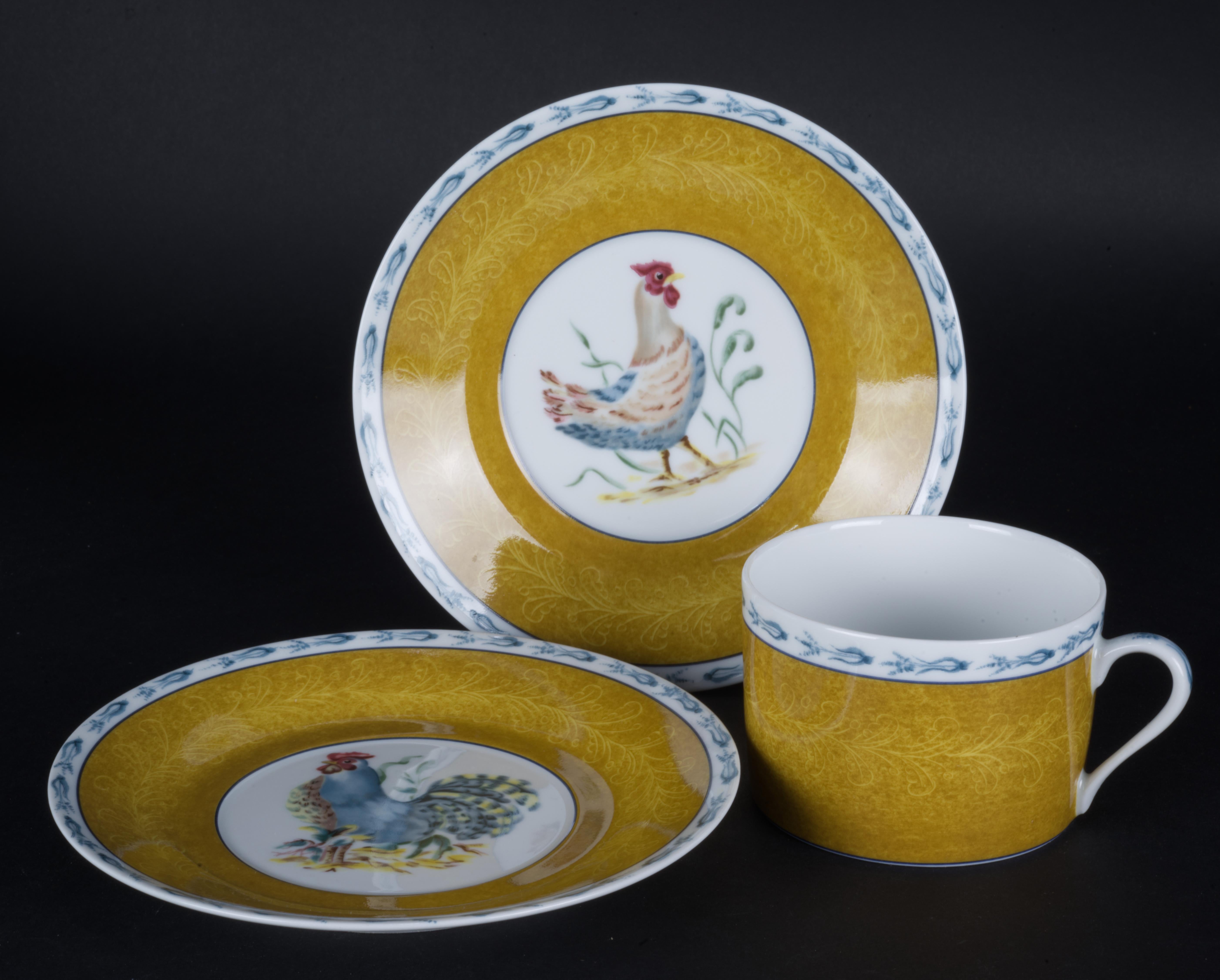 
Cup and saucers in Basse Cour pattern by Pierre Frey were made in France by Porcelaine de Limoges. The set consists of 1 cup and 2 saucers with different center decors - 1 hen and 1 rooster.

Basse Cour is a rare, discontinued pattern based on La