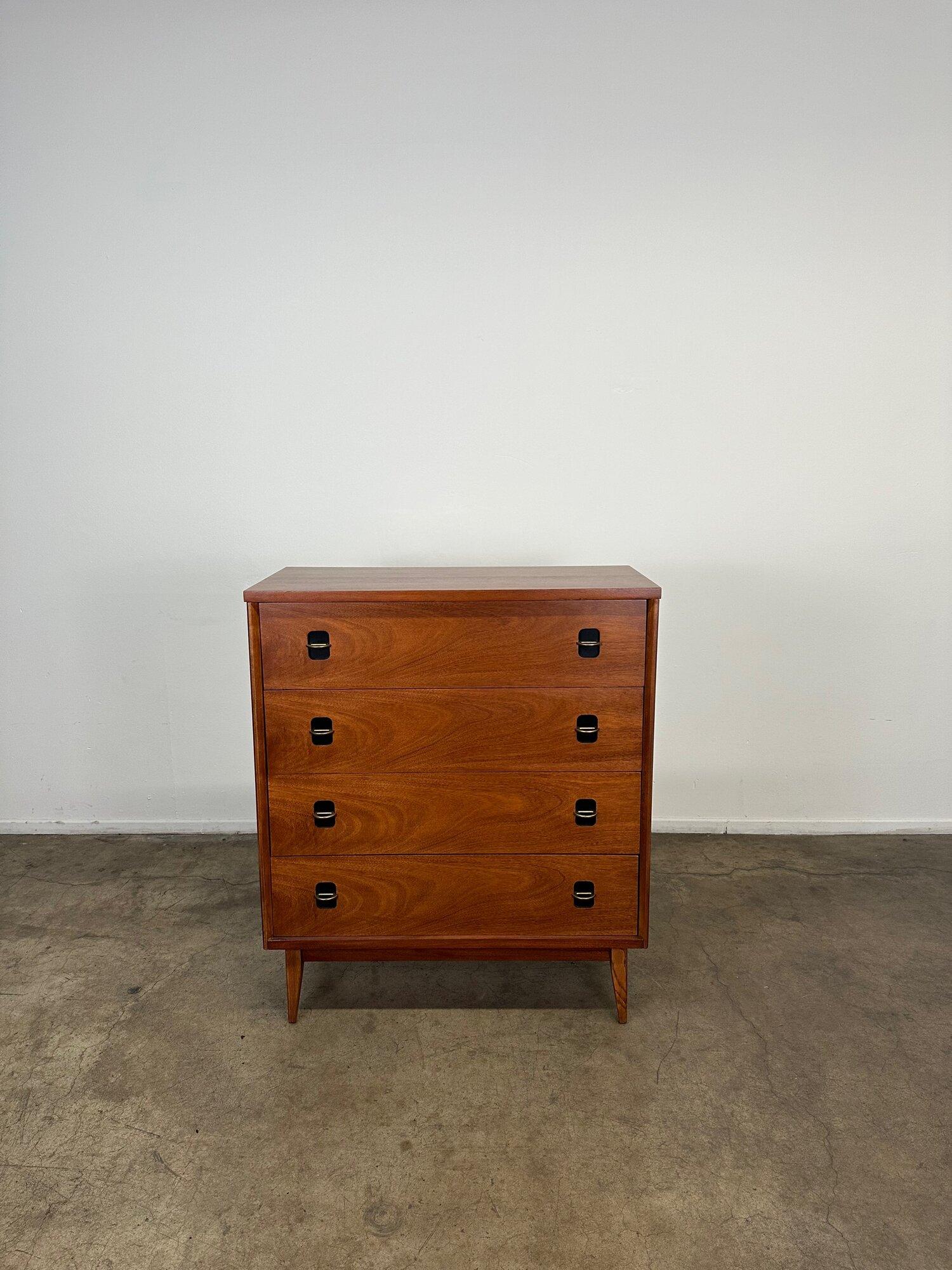 Basset Highboy with Brass & Black Detailing. Fully refinished with original brass hardware in tact. Inspected by our team of professionals, this item is overall structurally sound.
