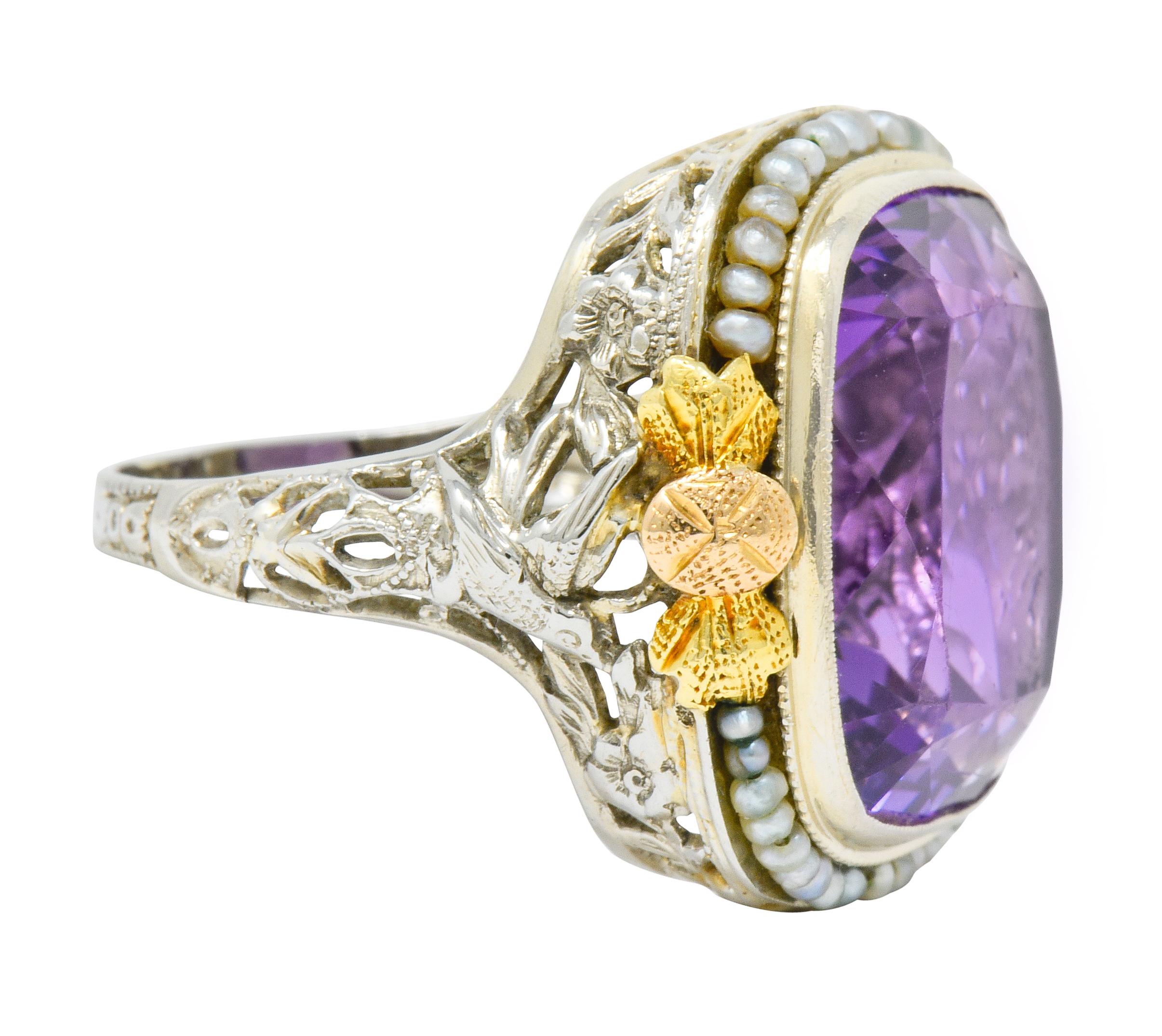 Centering a bezel set mixed cushion cut amethyst weighing approximately 13.34 carats, transparent and a vibrant purple color

Surrounded by a halo of strung natural freshwater seed pearls, well-matched in size with varied color and quality

Accented