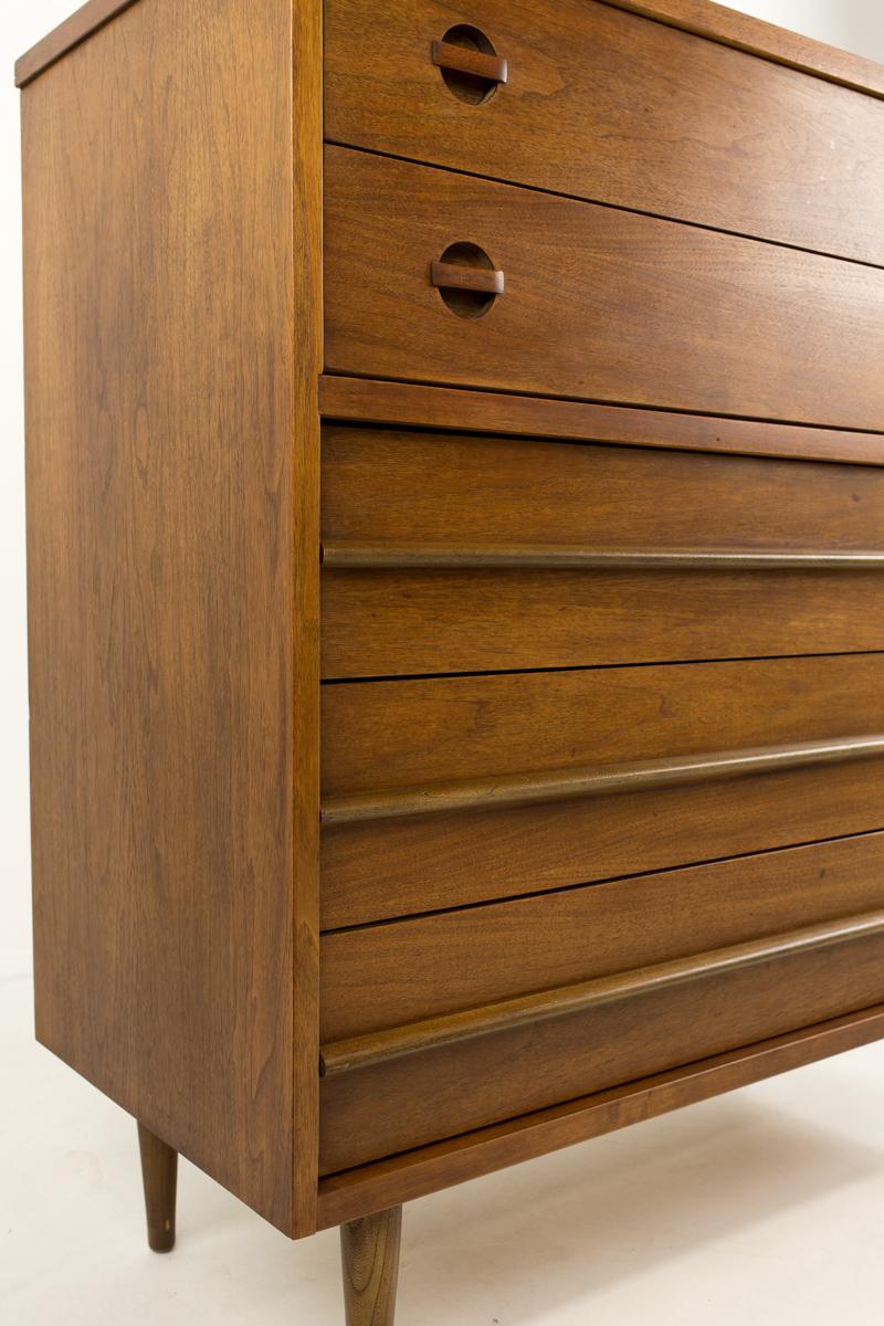 Bassett mid century walnut highboy dresser
This dresser measures: 40 wide x 18 deep x 42.5 inches high

All pieces of furniture can be had in what we call restored vintage condition. That means the piece is restored upon purchase so it’s free of