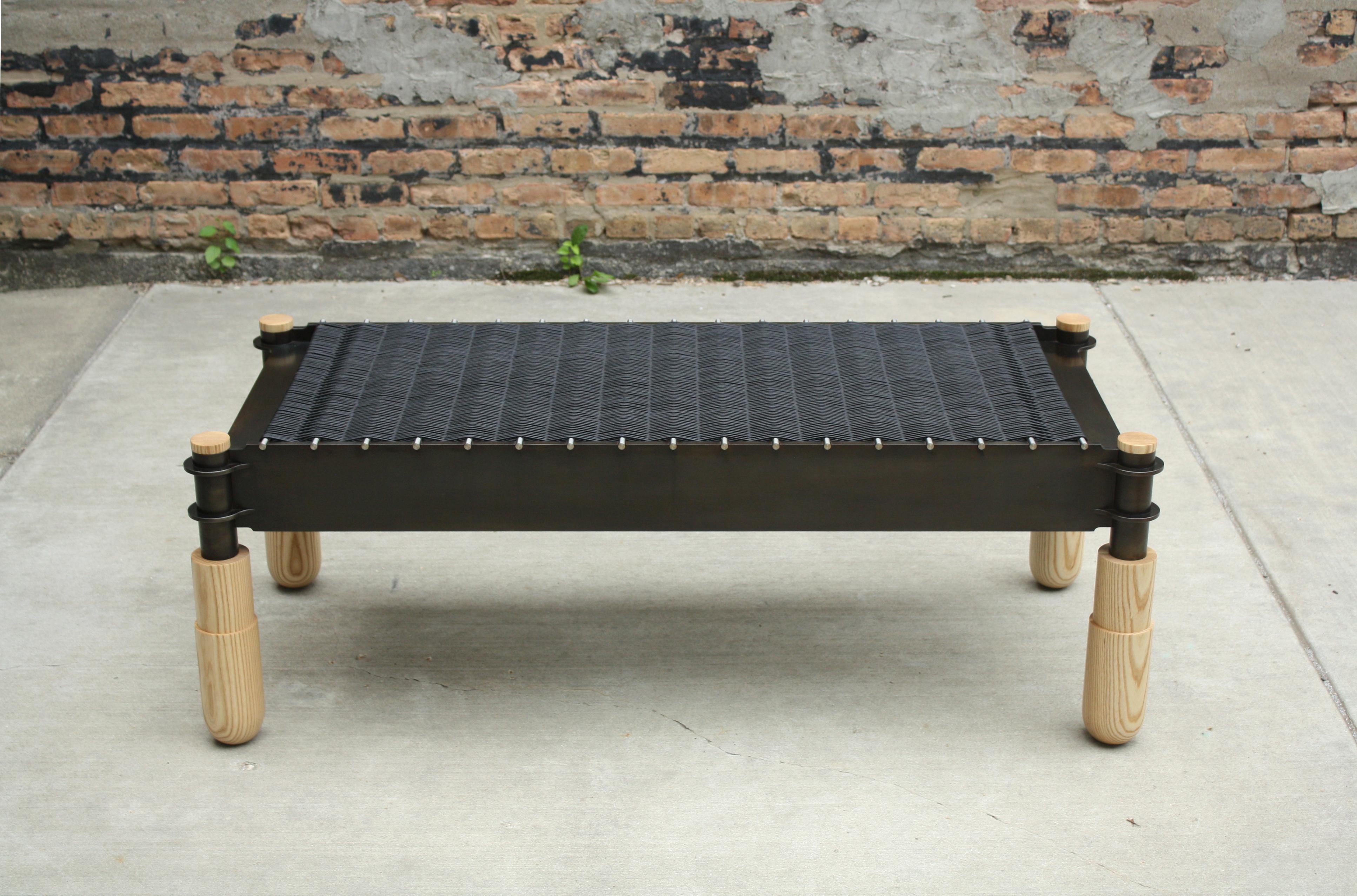 shown at various dimensions and finishes

blackened steel, brushed stainless, and black leather with natural ash and natural walnut legs 

standard (60-52” wide x 24-18” deep x 18” tall)

The BASSO bench by LAYLO is handmade to order in custom