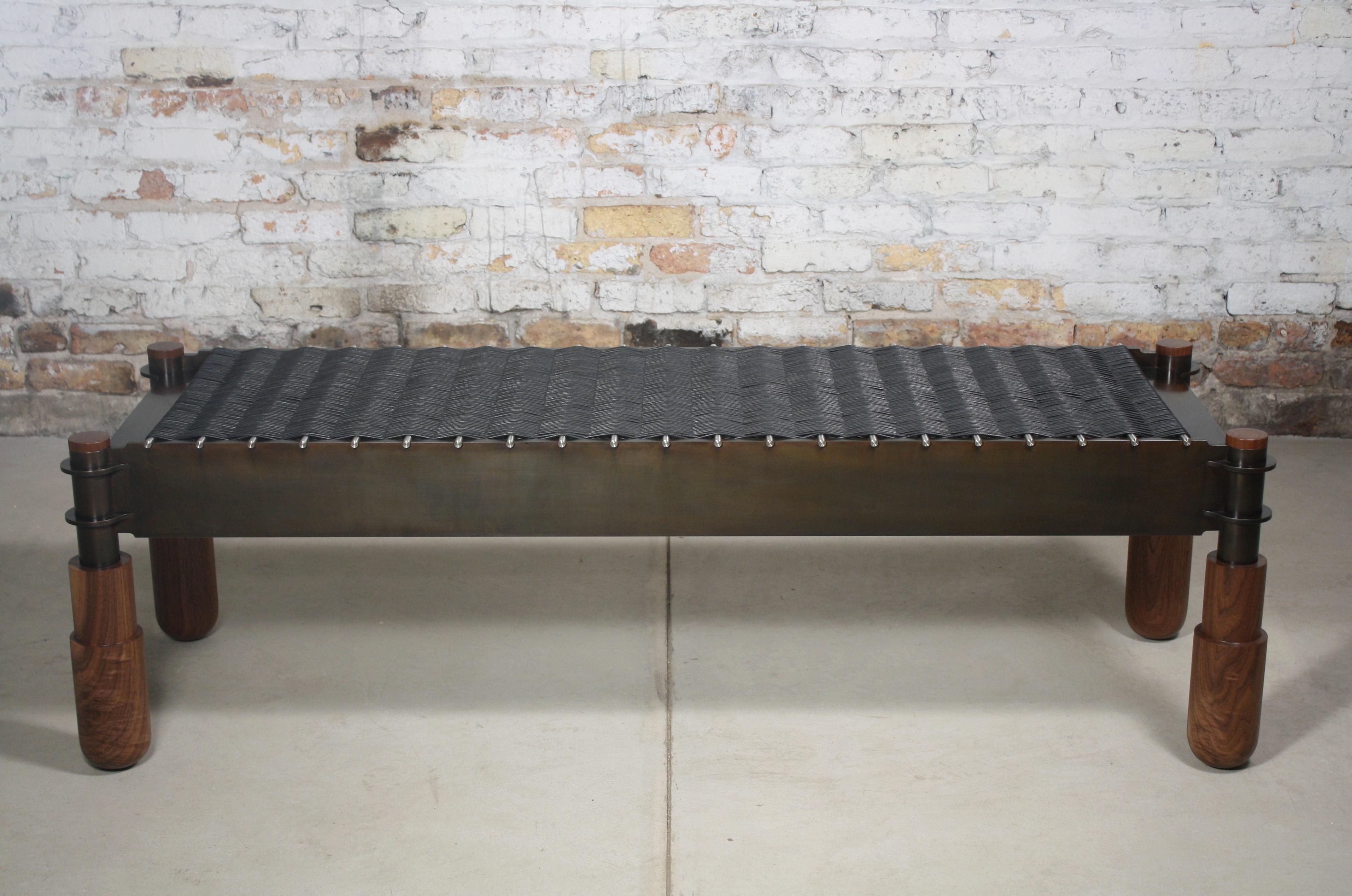 Shown in blackened steel, brushed stainless, natural walnut, and black leather.
at 20” wide x 18” high x 60” long
also shown with natural ash legs in various dimensions

The BASSO bench by LAYLO is handmade to order in custom dimensions and