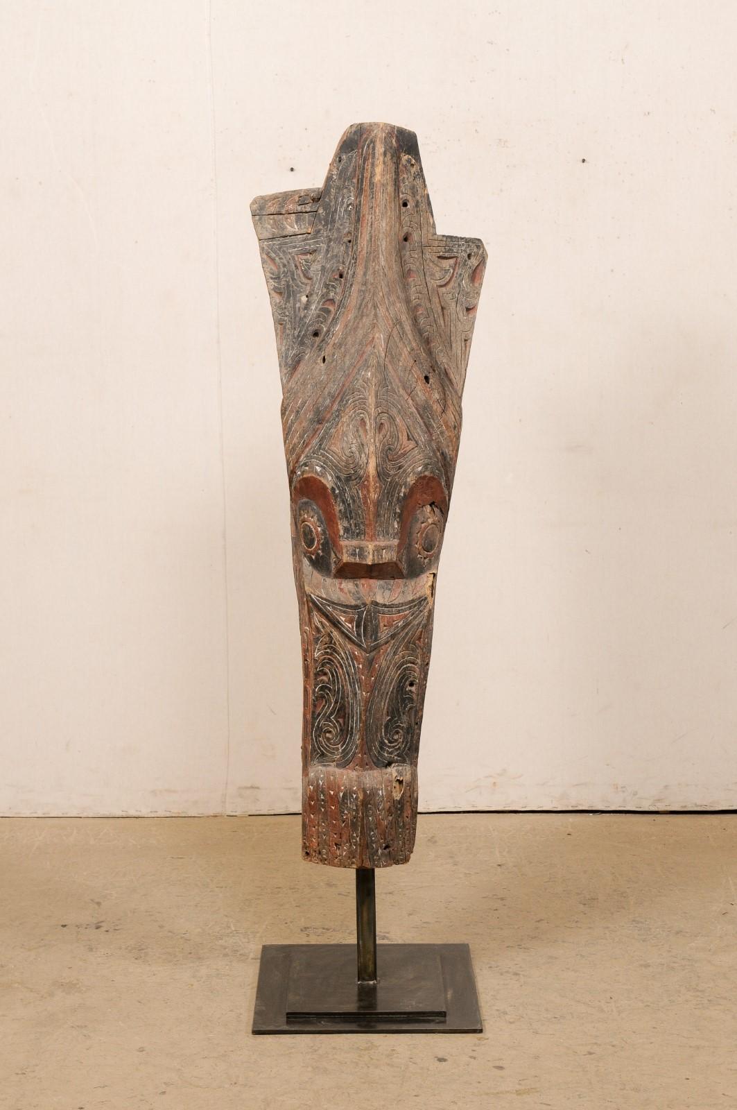 A Batak architectural carved-wood house panel from Northern Sumatra (Sumatera Utara) in the Indonesian Malay archipelago. This vintage carved house fragment from the Batak peoples of Northern Sumatra (Sumatra, Indonesia being the 2nd largest of the