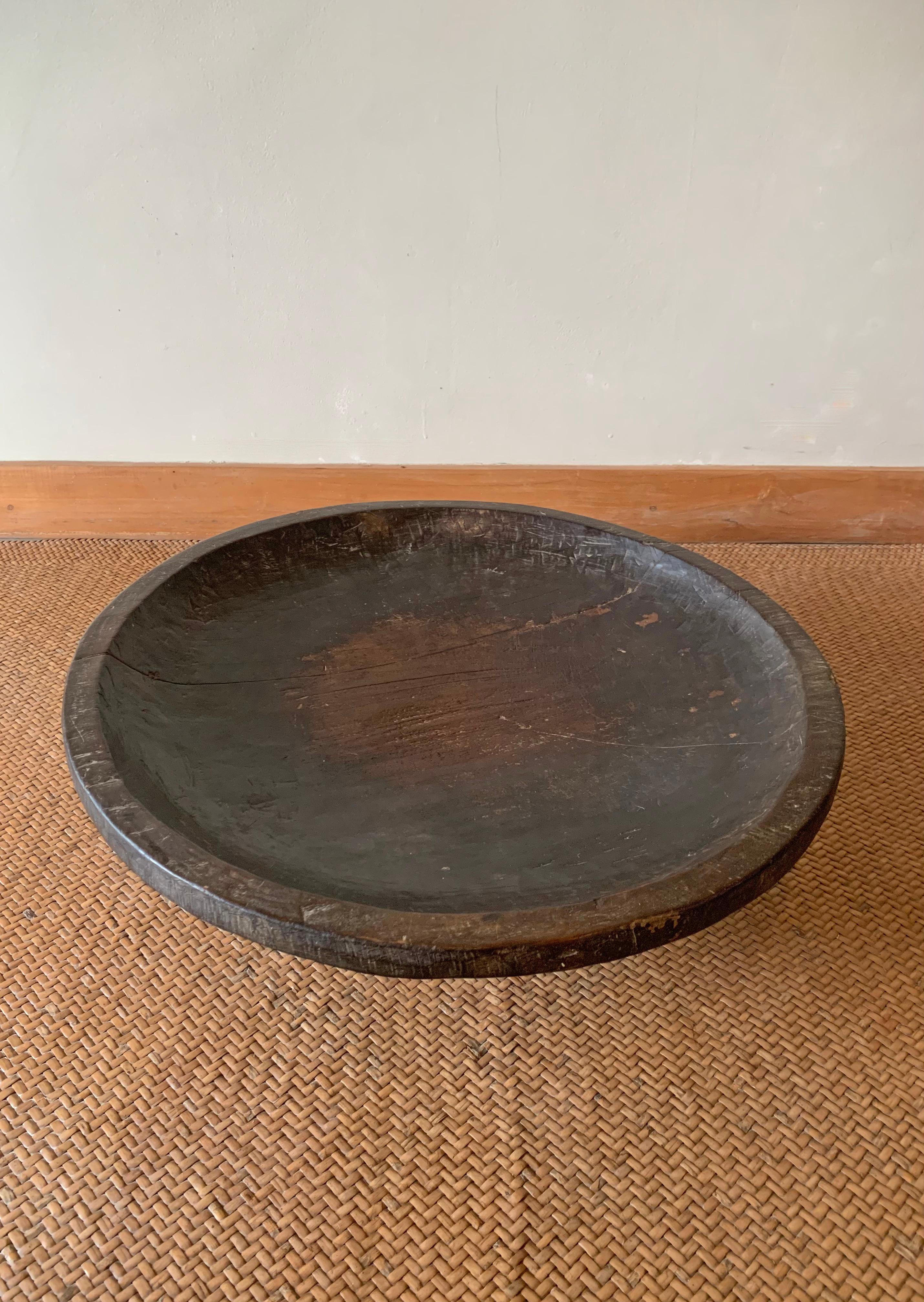 Batak tribe ceremonial bowl from jackfruit wood, early 20th century.

Dimensions: Diameter 45cm x height 18cm.