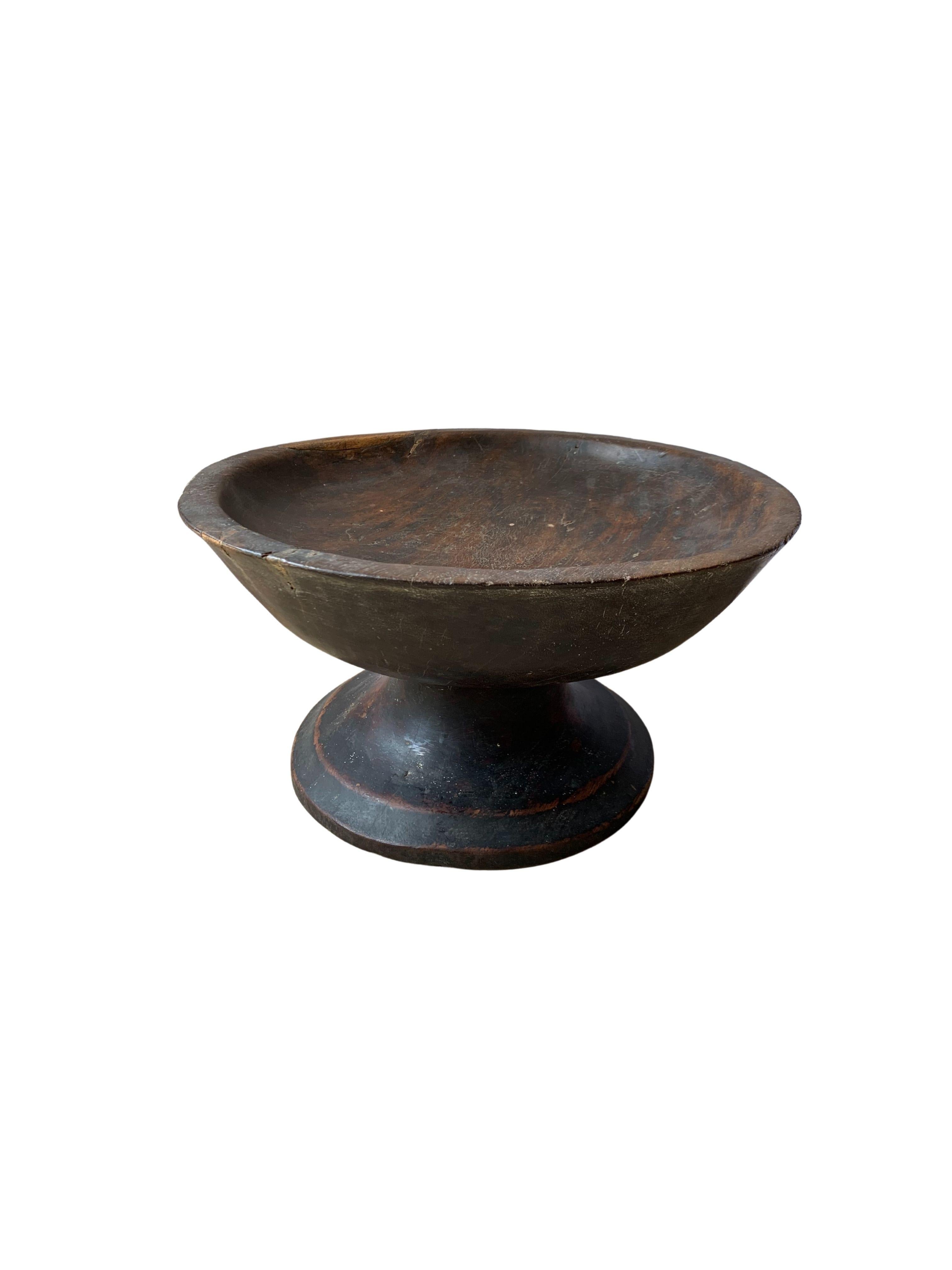 Batak tribe ceremonial bowl from jackfruit wood, early 20th century. The Batak Tribes are ethnic groups predominantly found in North Sumatra, Indonesia. 

