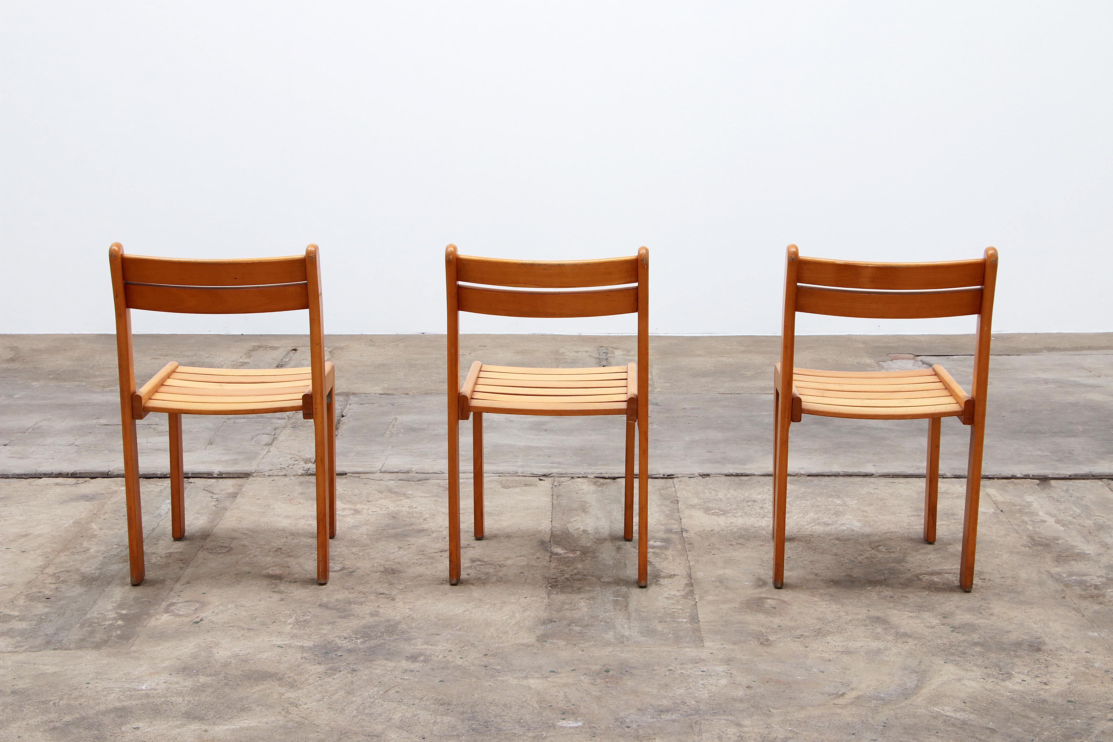 Batch of vintage French stacking chairs made of beech wood, 1960 1