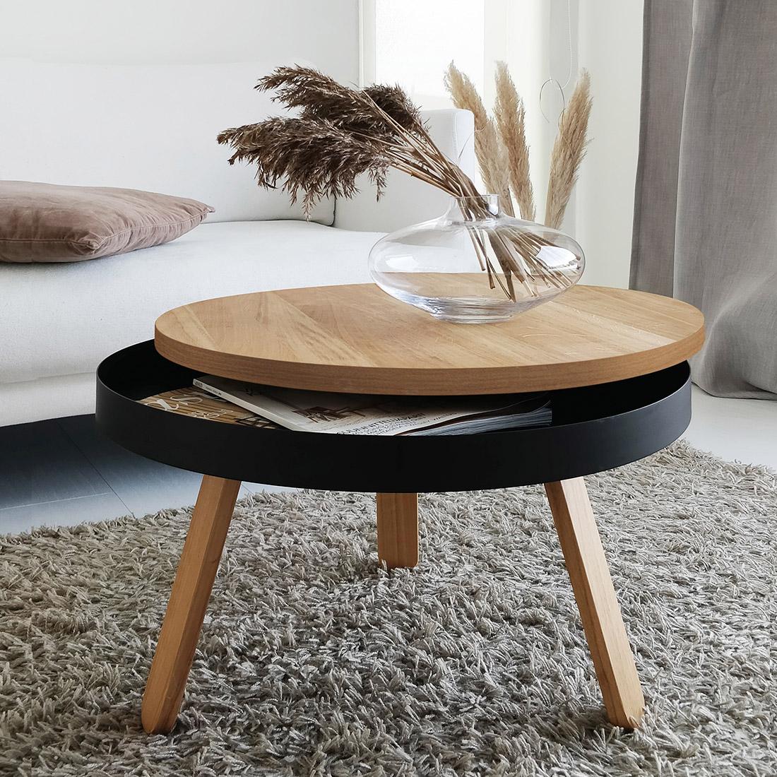 A round coffee table that combines tradition and modernity, adapting to the dynamics of each home space.

The medium-sized member of the Batea family is not just a wood side table, it has extra functionality, a small storage space where you can