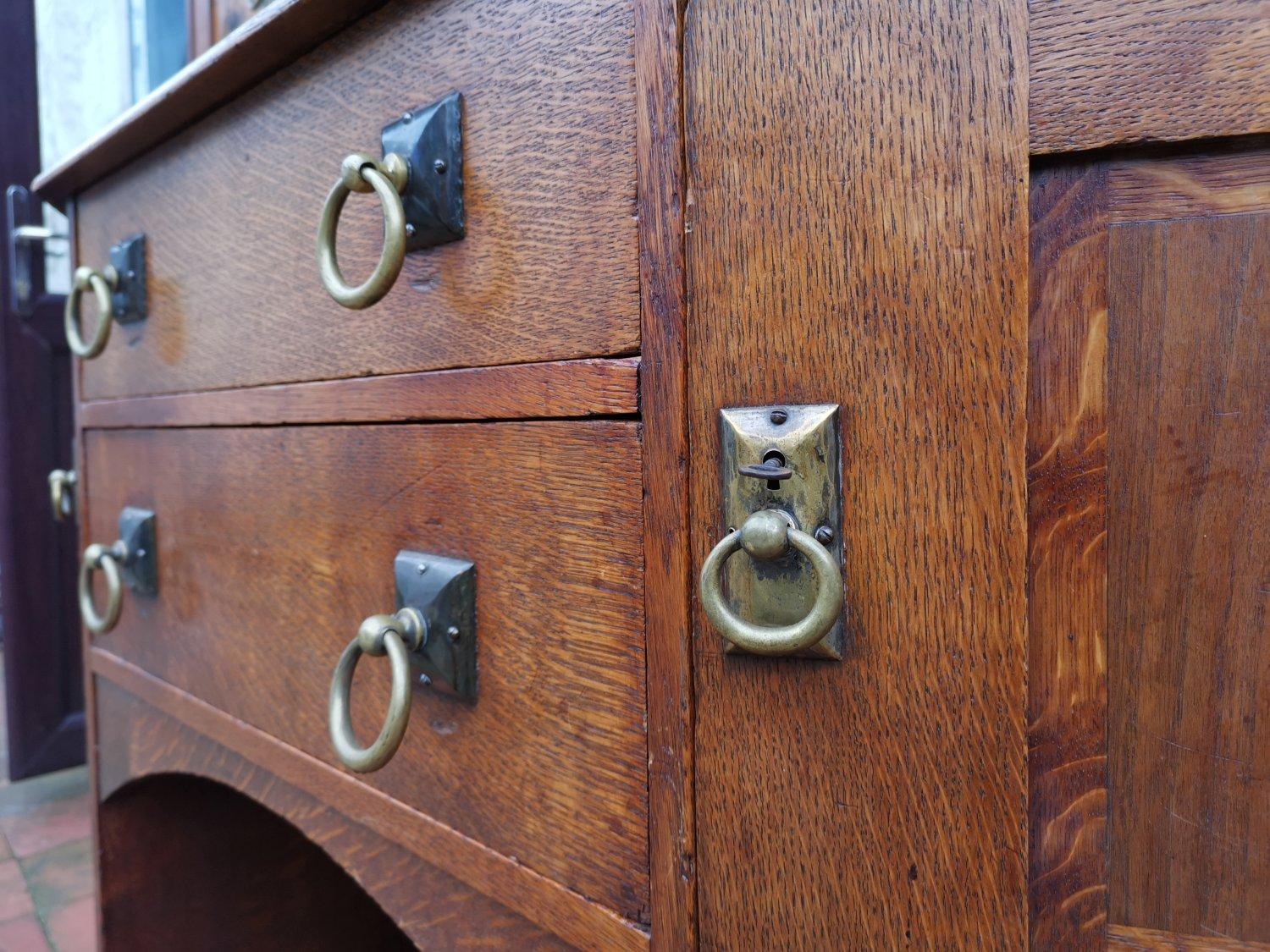 Bath Cabinet Makers, an Arts & Crafts Oak Sideboard with Dutch Inlaid Scenes For Sale 9