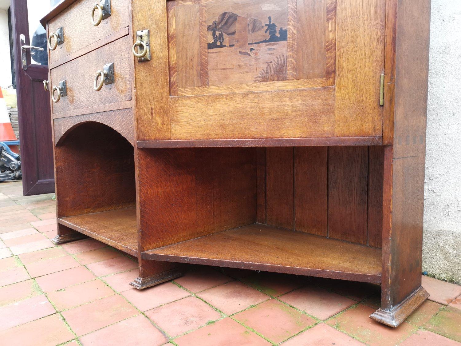 Bath Cabinet Makers, an Arts & Crafts Oak Sideboard with Dutch Inlaid Scenes For Sale 10