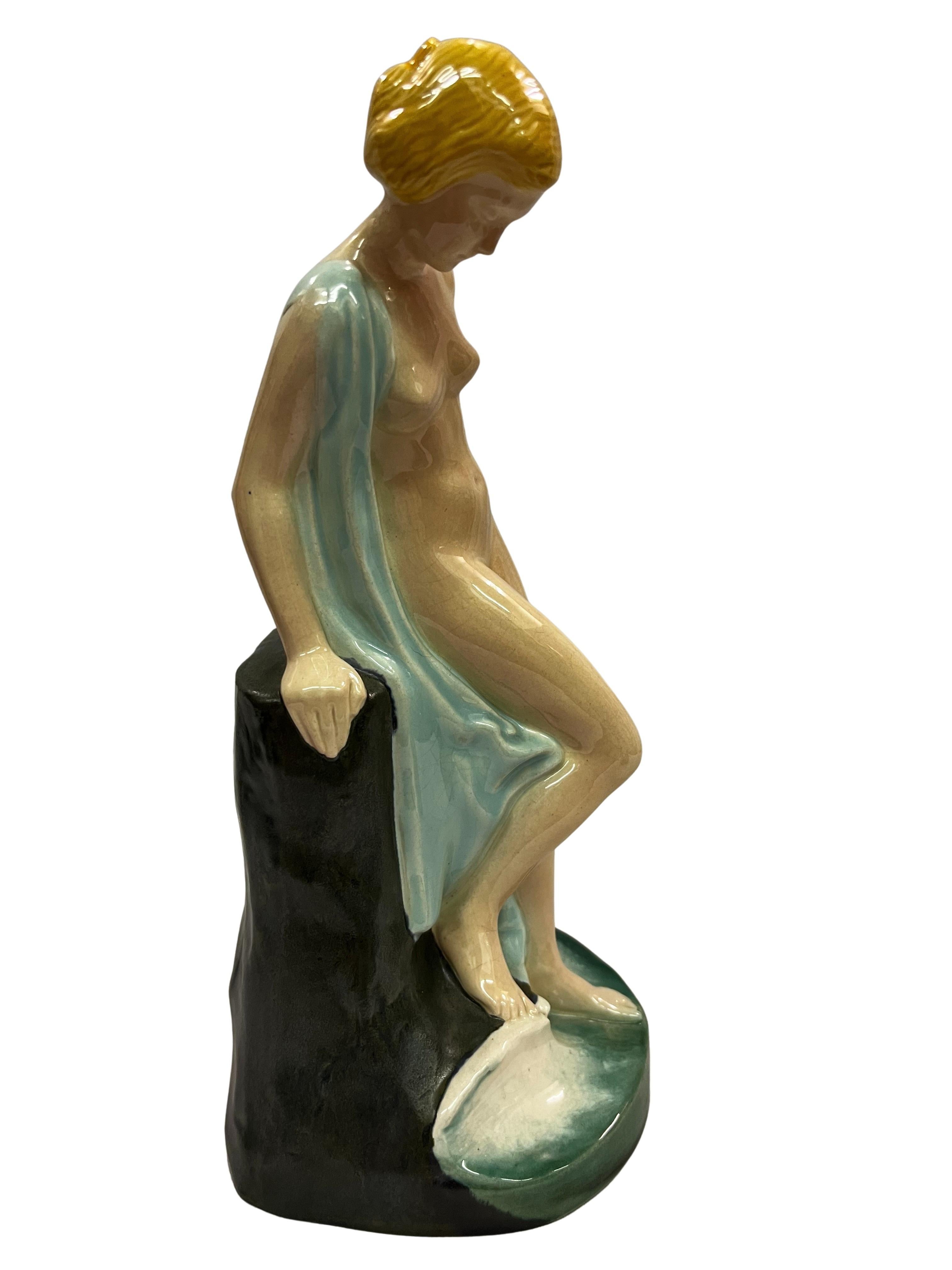Very rare figure, the bathing woman designed by Johanna Meier-Michel, executed by the Vienna Kunstkeramische Werkstätte, during the Art Nouveau period.

This ceramic piece, model 