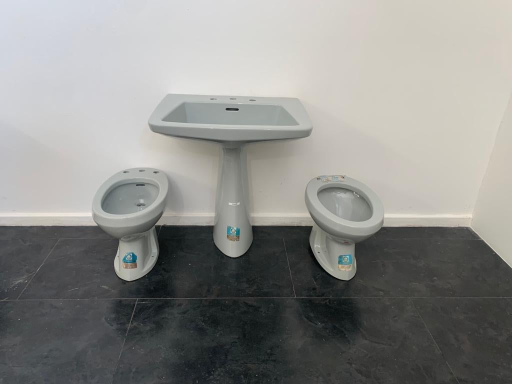 Sanitary ware designed by Gio Ponti for Ideal Standard. By removing the architectural clothing from the appliances, the column that pretends to hold the bowl of the washbasin, the raised collars that surround the profiles, we arrive at the true