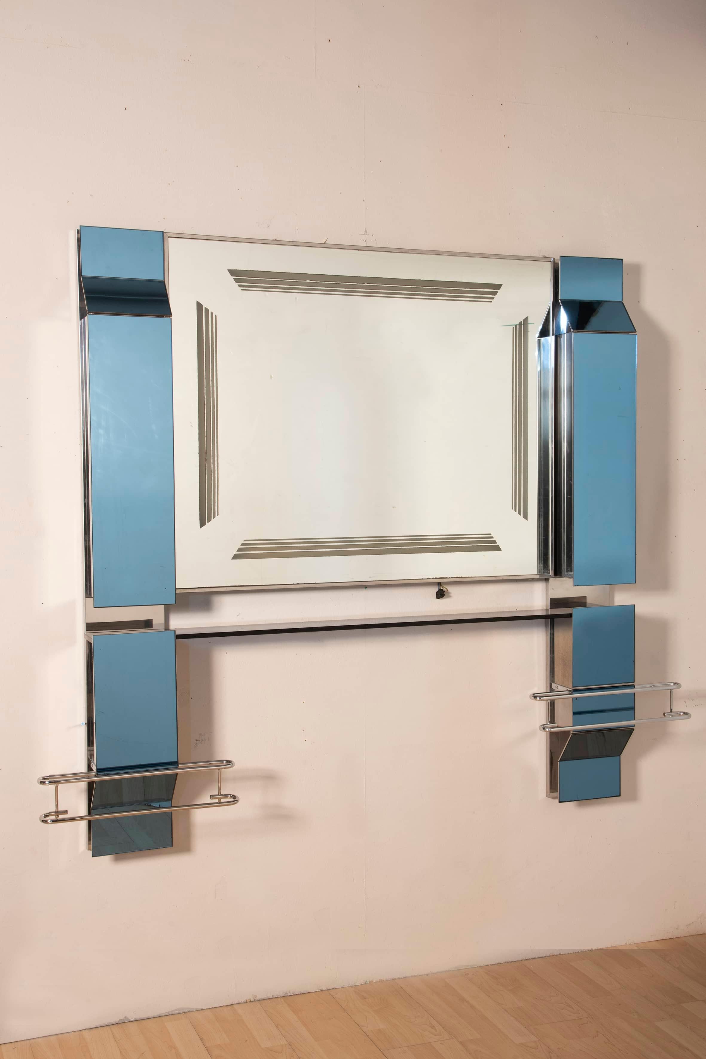 Rare Vintage Bathroom Furniture Mirrored Cabinet by FontanaArte with Lights. High blue side panels open and allow products to be arranged on small glass shelves. The blue mirror panels at the bottom, on the other hand, flip open and conceal