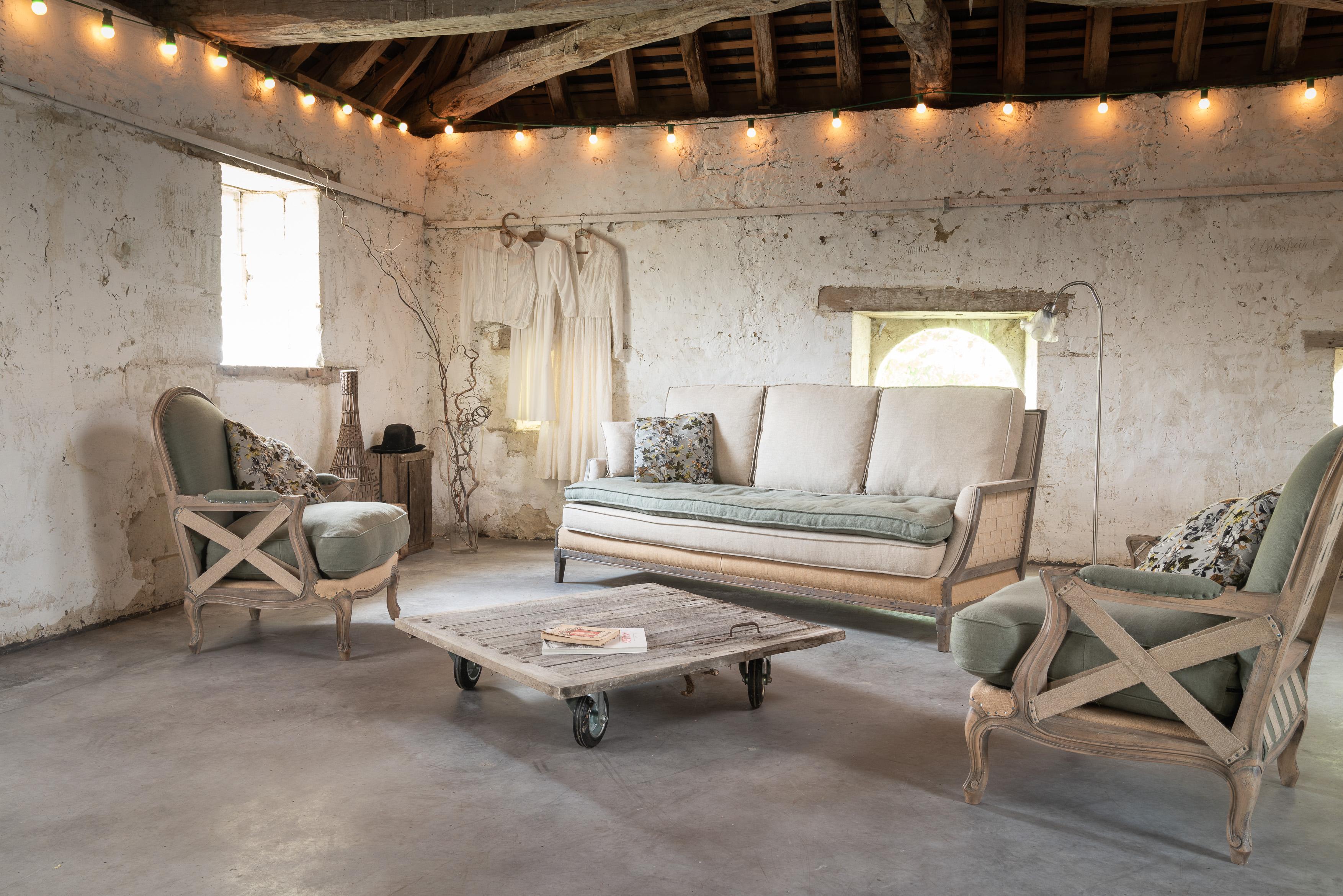 Batignolles Sofa by RALPH M
Dimensions: W 200 x D 92 x H 88 cm. 
Materials: Solid oak, Fabric.

Details: 
Frame: Solid oak.
Joinery: Mortise and tenon.
Seat springing: Interlaced latex webbing.
Seat cushion: 37kg/m3 high resilience foam. Quilted