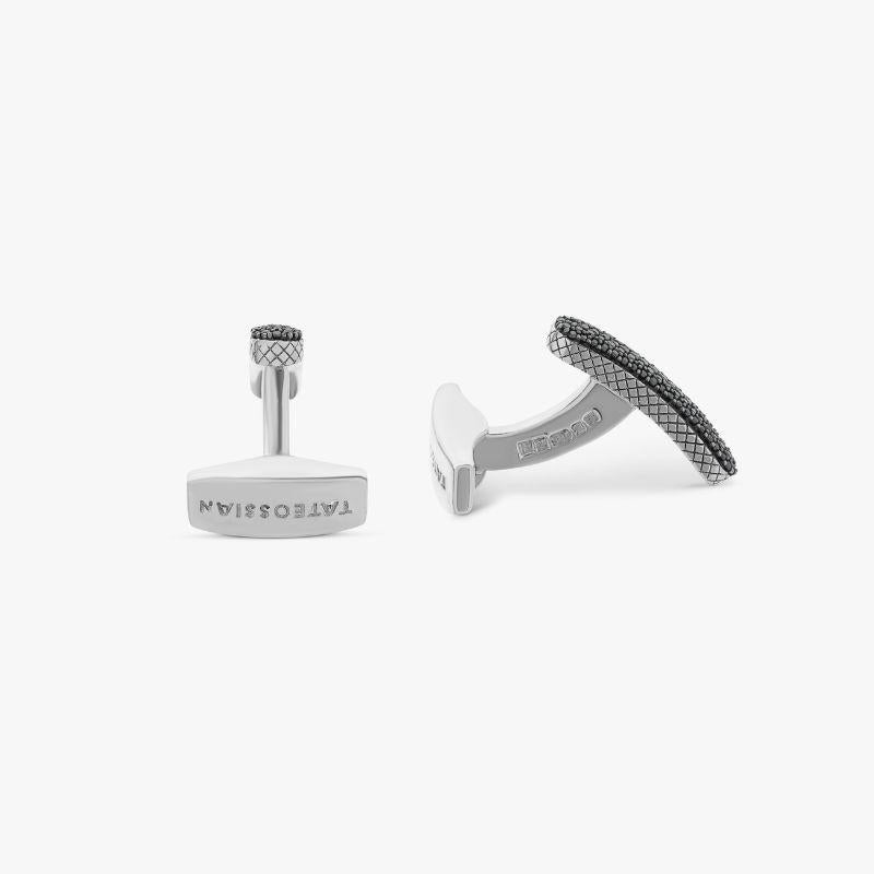 Baton Cufflinks with Black Diamond in Sterling Silver

198 single cut black diamonds (0.64ct) are the focal point of these stunning baguette shaped cufflinks in a sterling silver case. The diamonds catch the light from every angle, adding sparkle to