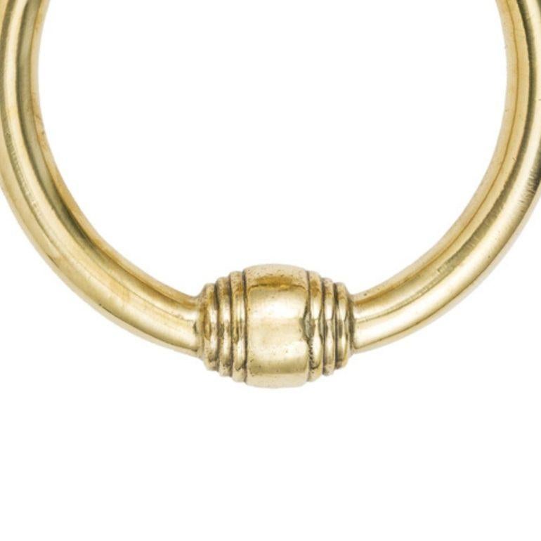 Add a touch of Gothic style to your front door with the Frankestein brass door knocker. This knocker features a classic round design with a detailed hand holding it. Made from high-quality brass, it's both durable and stylish.