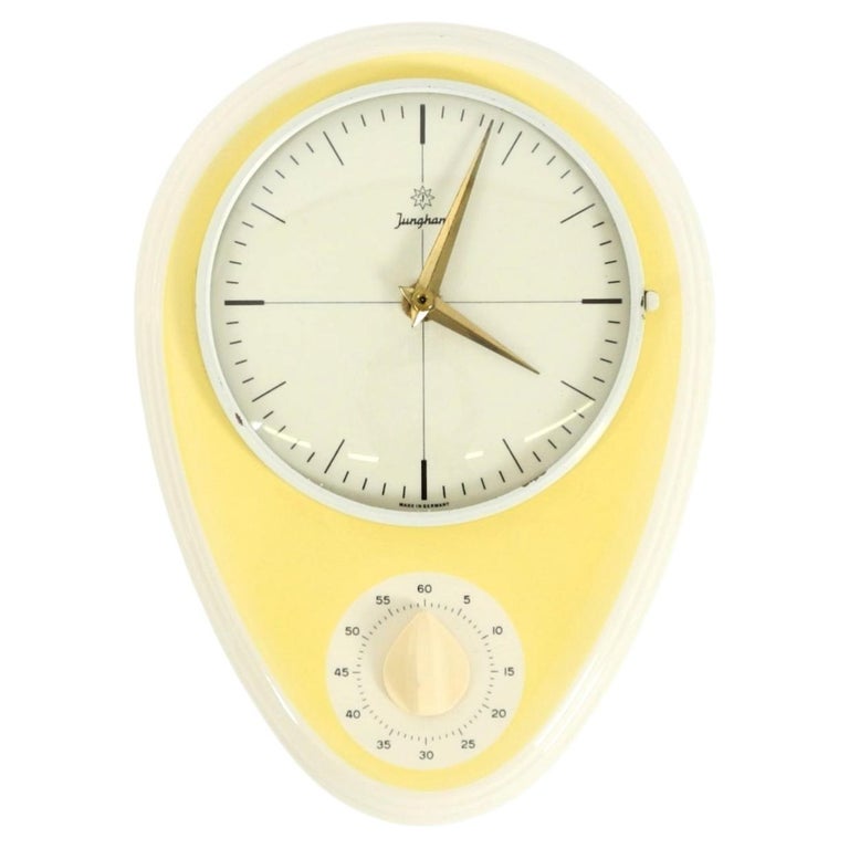Battery-operated Mid-Century wall clock by Mauthe with a glazed ceramic case