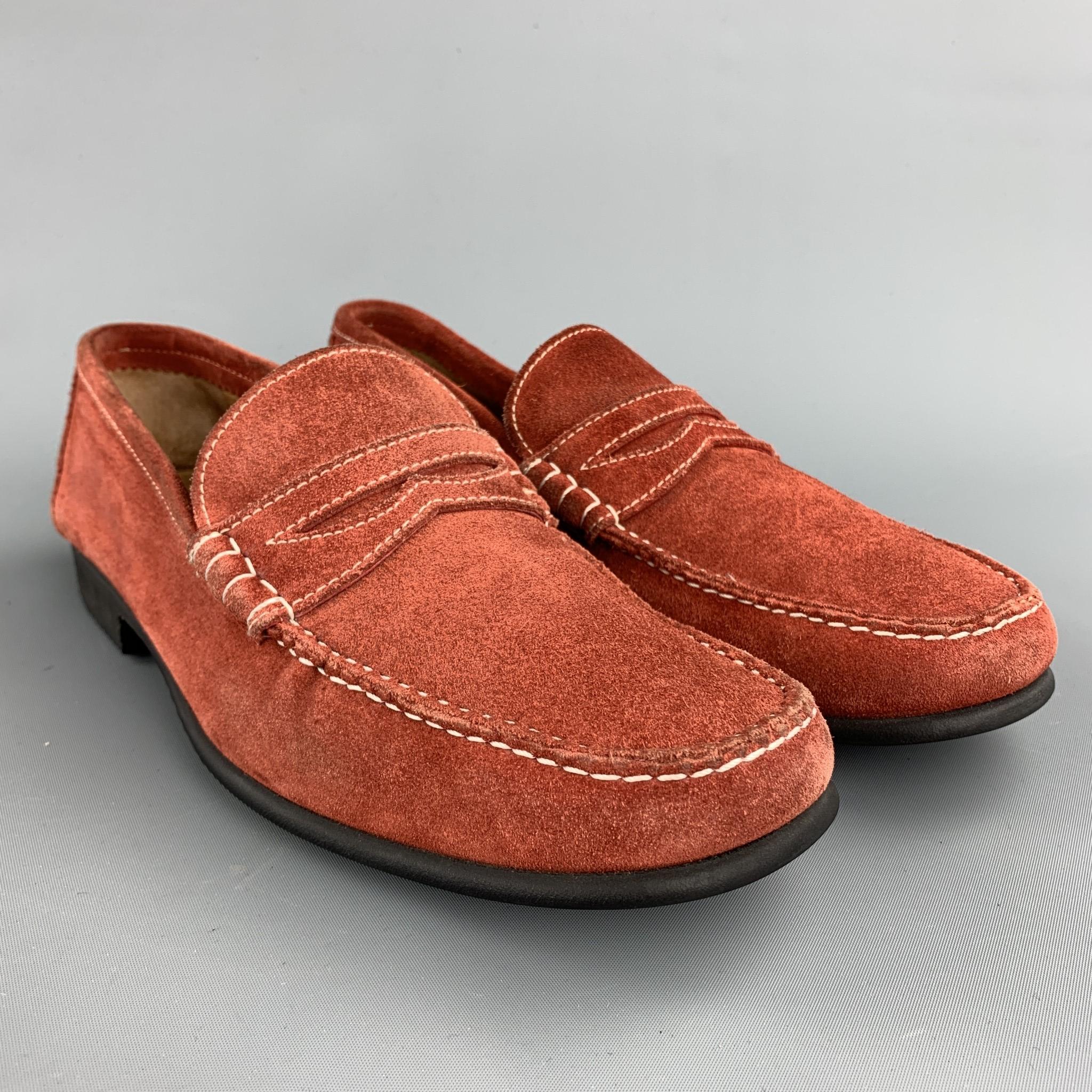 BATTISTONI loafers comes in a brick red suede featuring contrast stitching, penny strap, and a rubber sole. Made in Italy.

Excellent Pre-Owned Condition.
Marked: 6.5

Outsole: 

10.5 in. x 3.5 in. 

SKU: 73000
Category: Loafers

More Details
Brand: