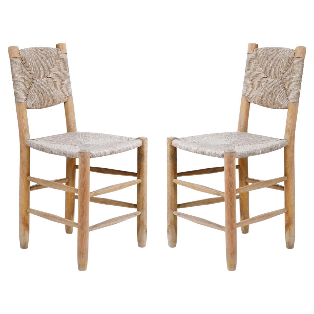 Pair of Bauche chairs by Charlotte Perriand, France, 1950s For Sale
