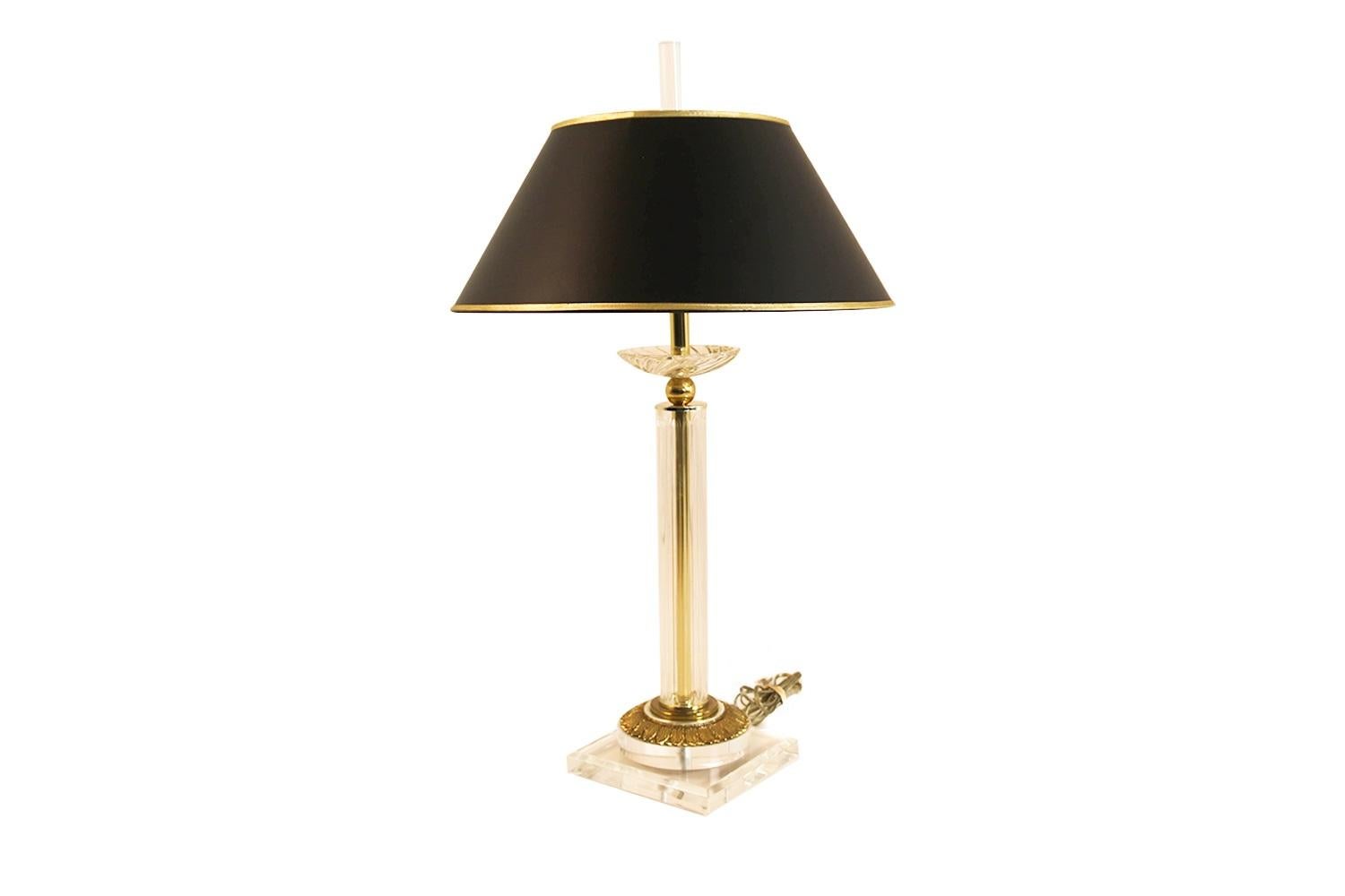Empire revival lamp by Bauer Lamp Company. A classic empire style Lucite and brass lamp featuring a fluted Lucite column with a brass interior stem, square Lucite base topped with an embossed brass cap. The fluted glass column is capped with an