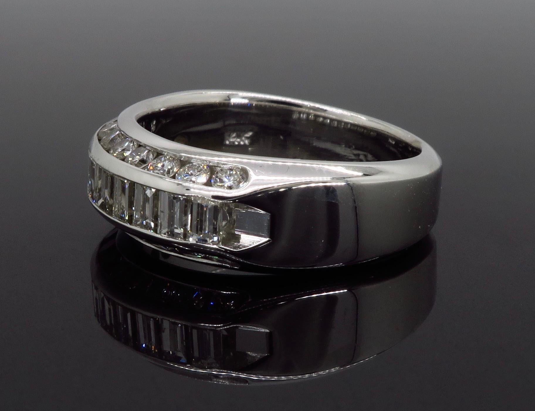 Diamond anniversary band featuring 1.05ctw of Round and Baguette cut diamonds.
Diamond Carat Weight: Approximately 1.05CTW
Diamond Cut: Round & Baguette Cut Diamonds
Color: Average  G-H
Clarity: Average SI2-I1
Metal: 14K White Gold
Marked/Tested: