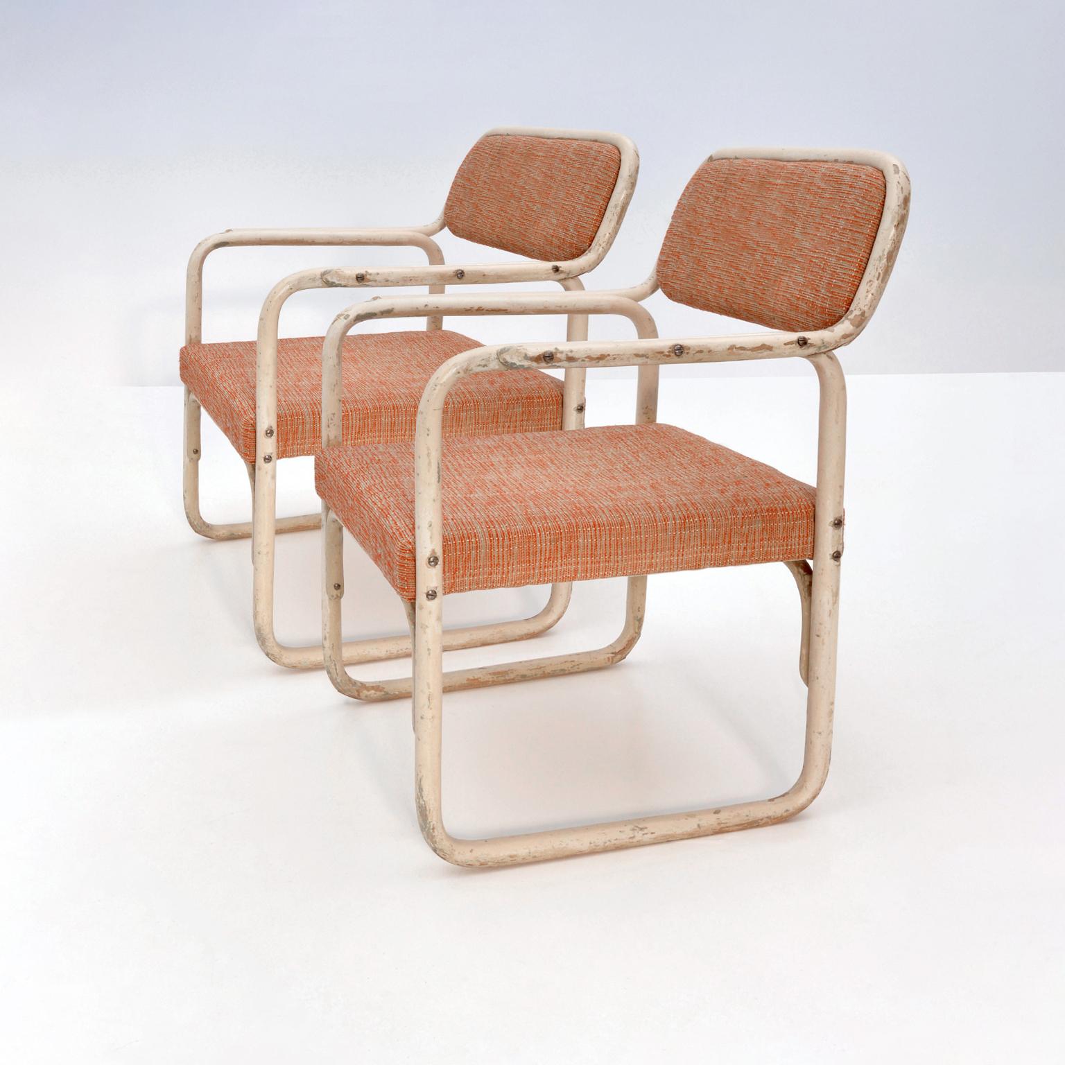 Modernist armchairs pair in Bauhaus style. The large lacquered bentwood armchair appeared in the Thonet-Mundus catalog from 1929 along with a rocking chair, a stool and a table. The appearance hardly suggested that it's made of bented wood and not