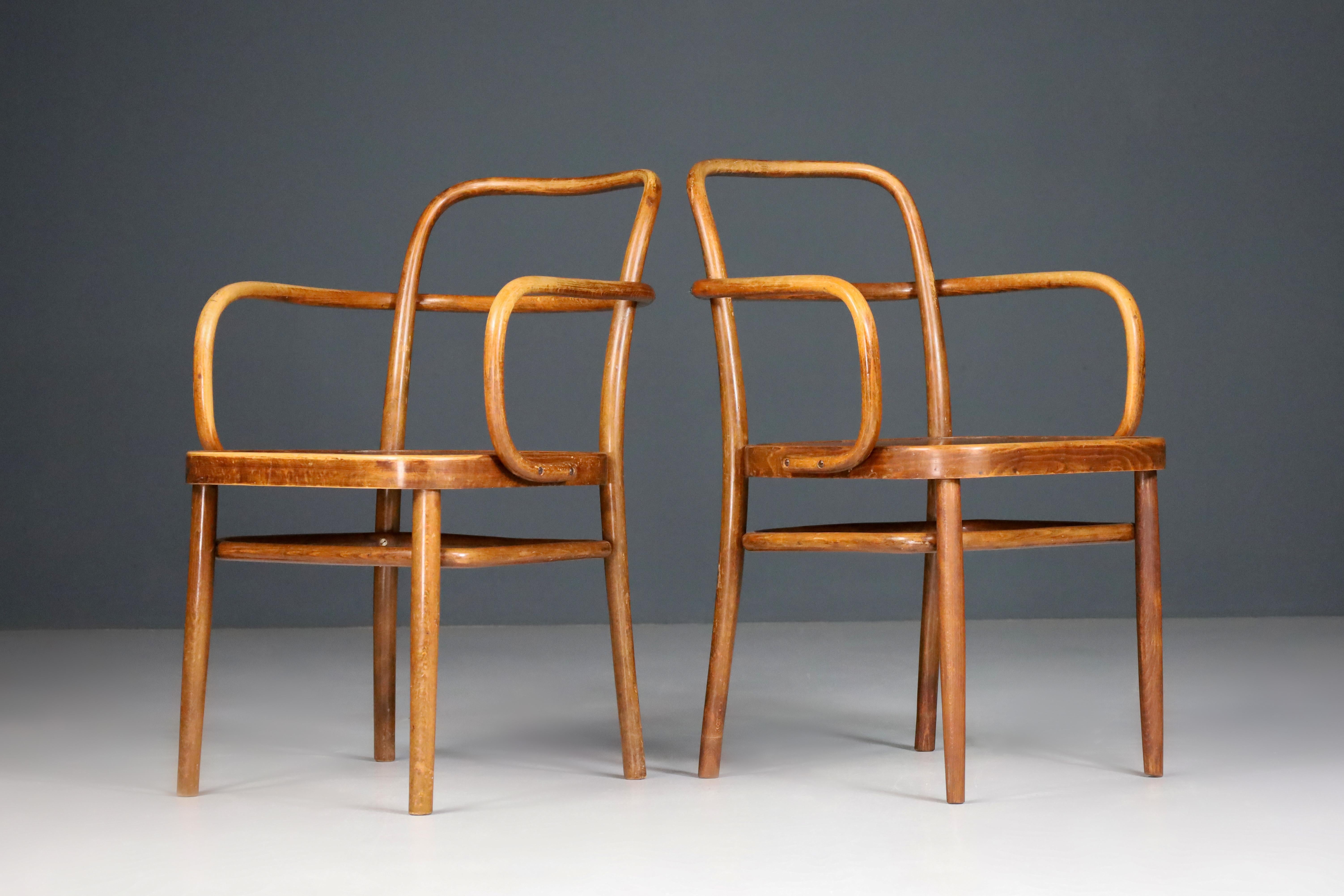 Armchairs by Adolf Gustav Schneck No. A 64 F Austria 1927.

Beech bentwood armchairs model No. A 64 F was designed by Gustav Adolf Schneck and made by Thonet in the late 1920s. These armchairs are in excellent original condition with a fantastic