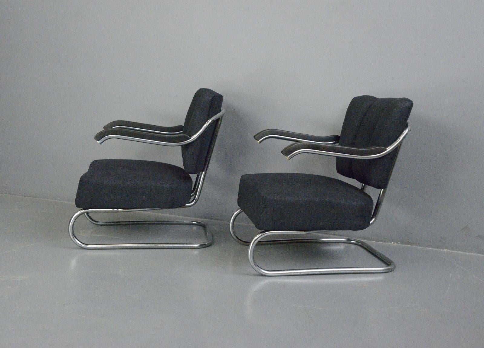 Bauhaus armchairs by Mucke Melder Circa 1930s

- Price is for the pair
- Chromed tubular steel frames
- Sprung seats and cantilever frames
- New black/charcoal plush upholstery
- Black stained beech arms
- Produced by Mucke Melder
- Czech ~